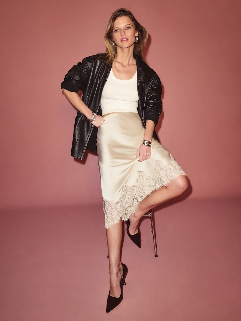 Elevate your wardrobe with the Carolina Silk Skirt by Reformation, crafted from luxurious silk for a smooth, lightweight feel. Its elegant drape and subtle sheen make it perfect for both professional settings and sophisticated evenings. Designed for comfort and style, this skirt moves gracefully with you, offering a refined silhouette that enhances any outfit. Ideal for those who appreciate expert tailoring and timeless fashion.