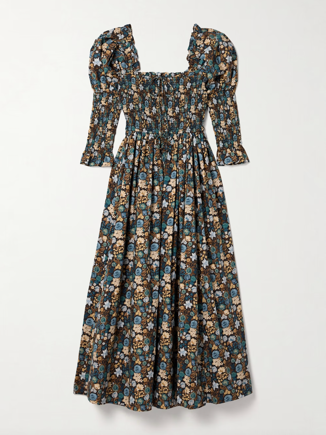 Crafted from breathable organic cotton-voile, DÔEN's Bijou dress showcases the label's signature Bleu Arbor Floral print. The smocked bodice provides gentle structure, while voluminous puffed sleeves trimmed with elastic offer styling versatility—wear them on or off the shoulder for effortless transitions from day to evening. A refined midi silhouette that balances comfort with understated elegance.