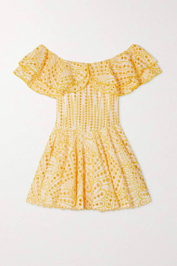 The Dalia Off-the-shoulder Mini Dress by Charo Ruiz Ibiza showcases delicate broderie anglaise embroidery on a breathable cotton-blend fabric. Its ruffled neckline enhances a sophisticated yet playful silhouette, perfect for warm-weather occasions. The yellow hue adds a vibrant touch, making this dress an elegant choice for stylish summer outings or resort wear.