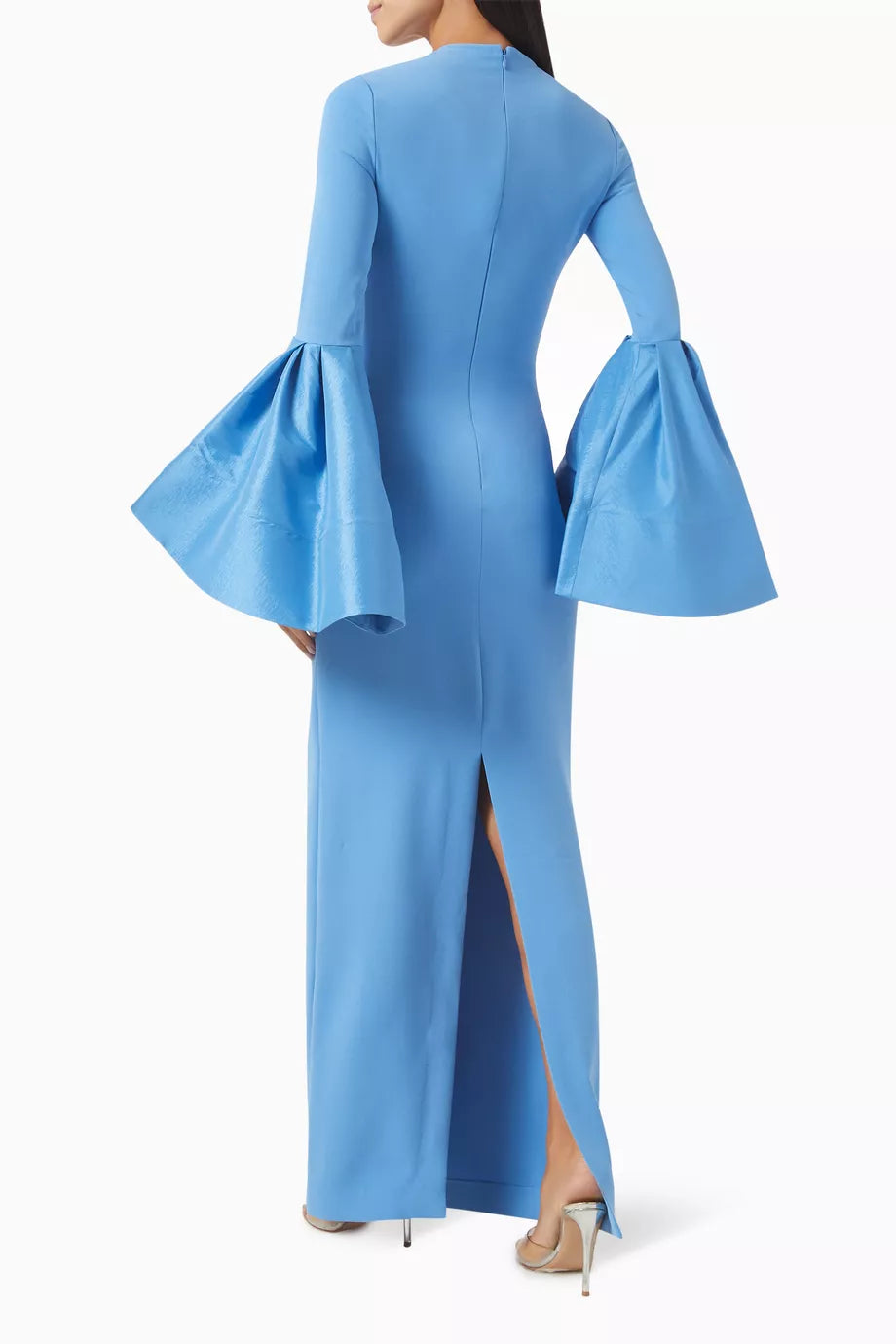 The Suri Flare-sleeve Maxi Dress by Solace London is expertly tailored for elegance and movement. Its dramatic flared cuffs create a striking silhouette, perfect for upscale occasions, while the rear slit offers both style and ease of movement, allowing you to navigate social settings with confidence and grace.