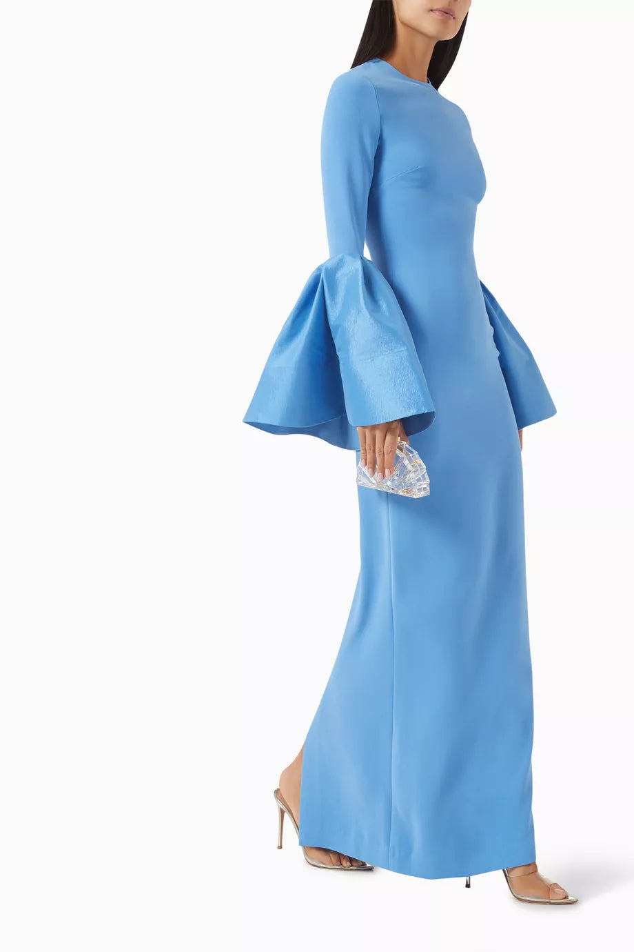 The Suri Flare-sleeve Maxi Dress by Solace London is expertly tailored for elegance and movement. Its dramatic flared cuffs create a striking silhouette, perfect for upscale occasions, while the rear slit offers both style and ease of movement, allowing you to navigate social settings with confidence and grace.