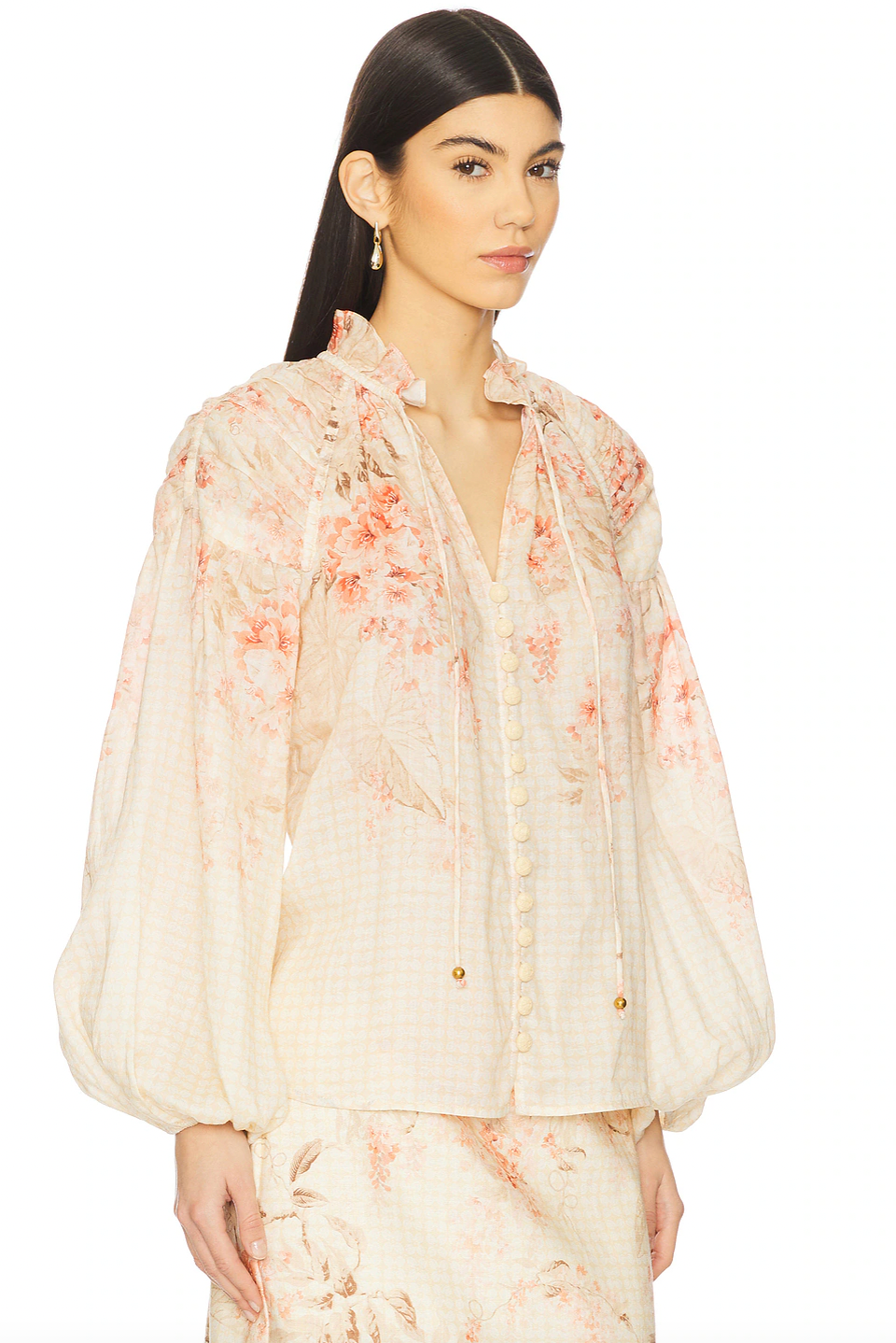 This blouse crafted from breathable linen offers a comfortable, lightweight feel ideal for warmer days. Featuring a front button placket with loops and a stylish front lace-up detail, it combines classic design with a contemporary touch. Elastic cuffs ensure a secure yet flexible fit at the sleeves. For optimal care, professional dry cleaning is recommended to preserve the fabric’s quality and shape.