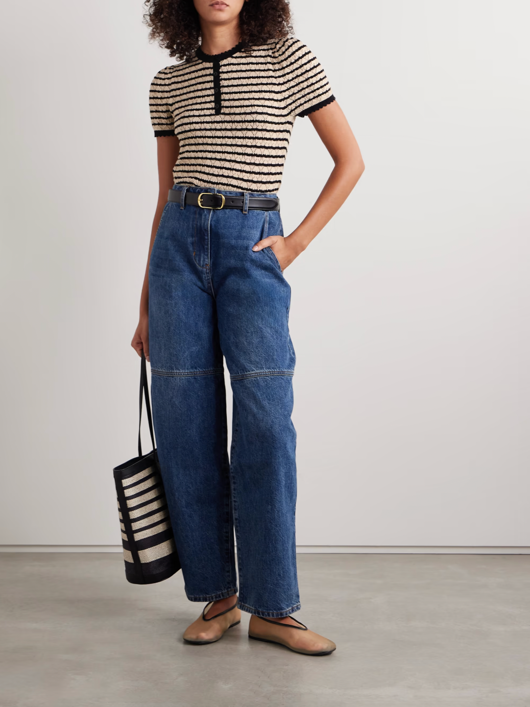 The Brandie striped pointelle-knit top by DÔEN blends cotton and silk for a soft, breathable feel. Its delicate pointelle-knit detailing and contrasting stripes add subtle texture and visual interest. Designed with a slightly loose fit, it features scalloped trims on the crew neckline, short sleeves, and hem for a refined finish.