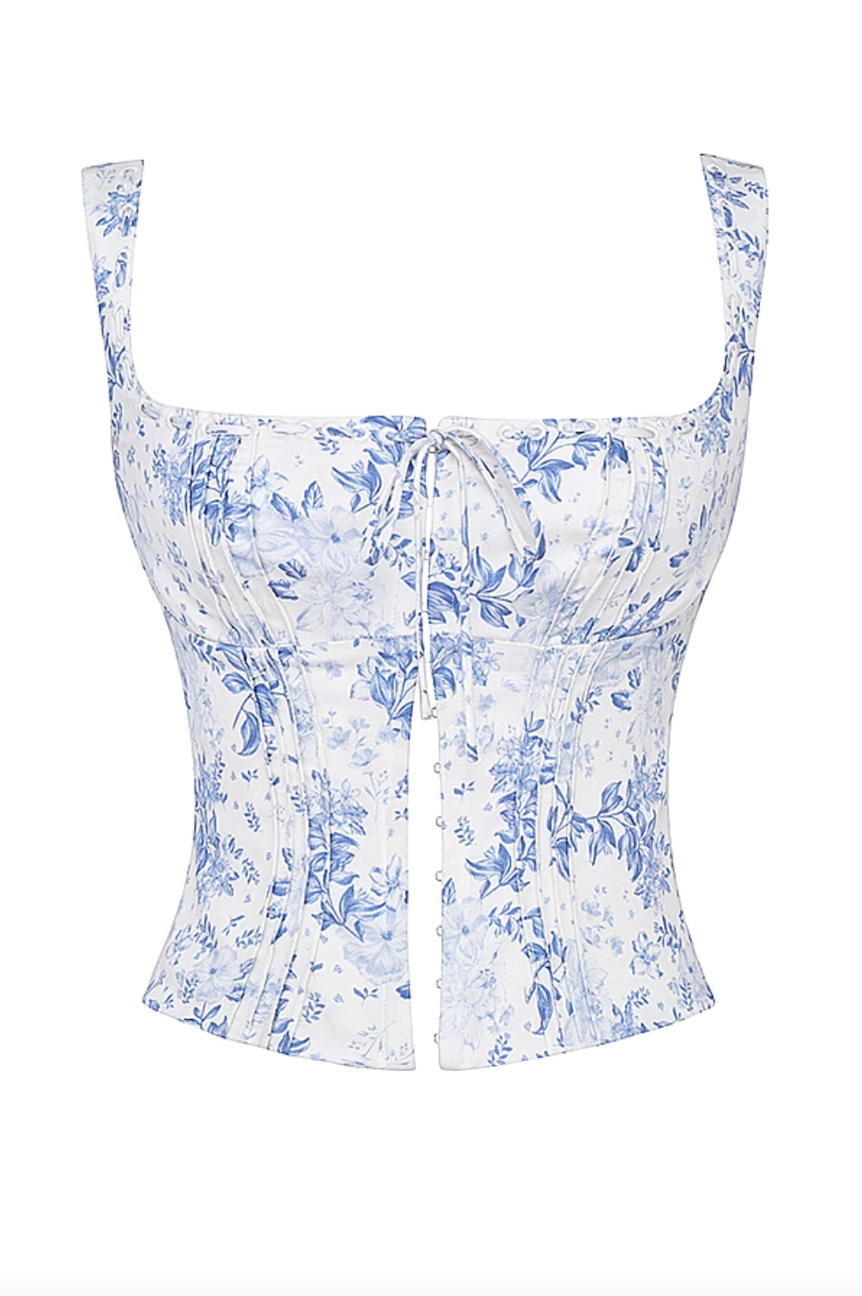 Cut from soft linen, this Blue Floral Print Top offers a relaxed silhouette paired with a curved square neckline that flatters your décolletage. Its shaped bust enhances structure while ensuring comfort, making it an ideal choice for garden parties and warm-weather occasions. The delicate blue floral pattern adds a refined touch, combining effortless elegance with breathable fabric for all-day wear.