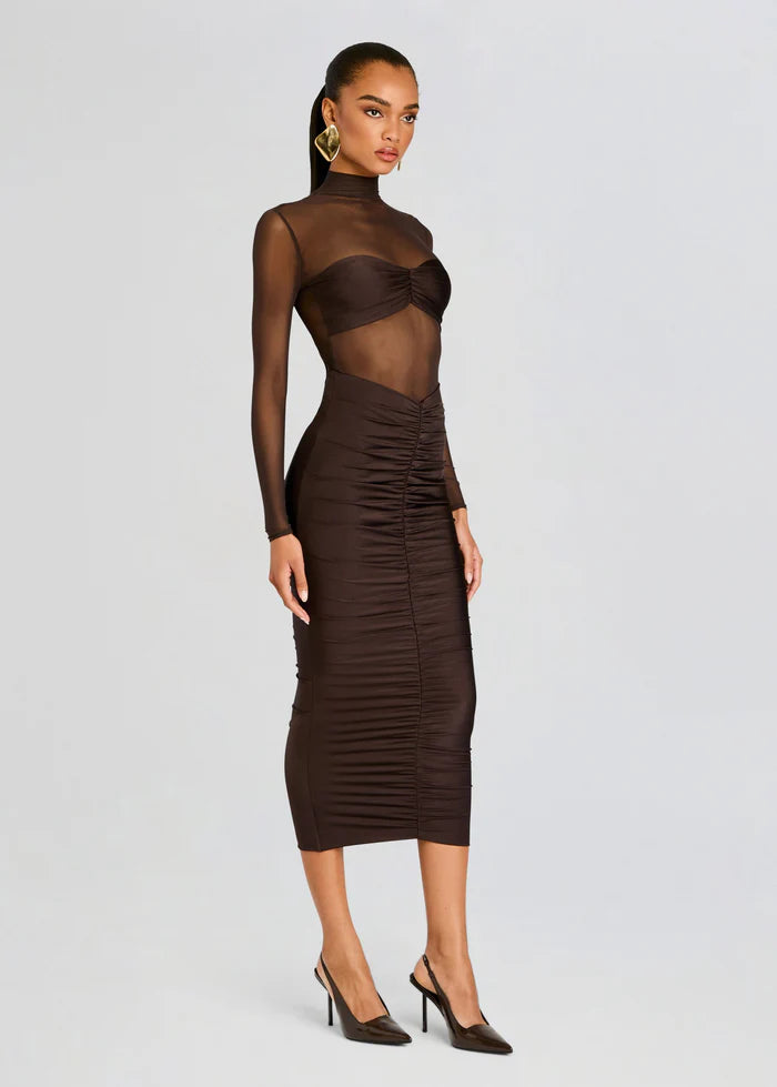 Elevate your style with the Levina Dress by SEROYA, a masterful blend of modern elegance and refined allure. This bodycon midi piece features a sheer bodice paired with a sleek bandeau detail, expertly tailored to accentuate your silhouette with subtle sophistication. Perfect for occasions demanding both poise and a touch of boldness, the Levina Dress in Ash Brown offers a striking yet understated statement.