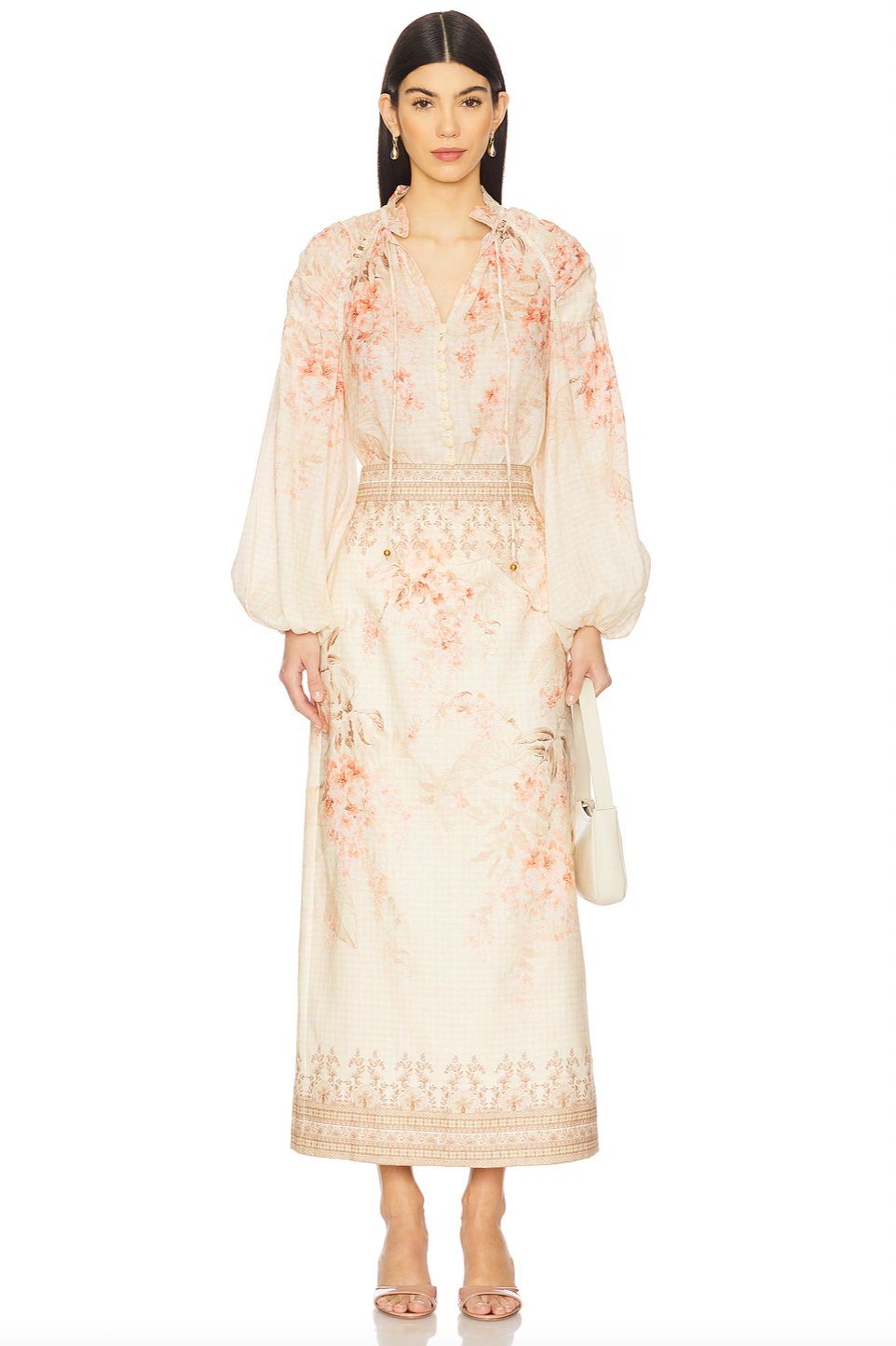 This blouse crafted from breathable linen offers a comfortable, lightweight feel ideal for warmer days. Featuring a front button placket with loops and a stylish front lace-up detail, it combines classic design with a contemporary touch. Elastic cuffs ensure a secure yet flexible fit at the sleeves. For optimal care, professional dry cleaning is recommended to preserve the fabric’s quality and shape.