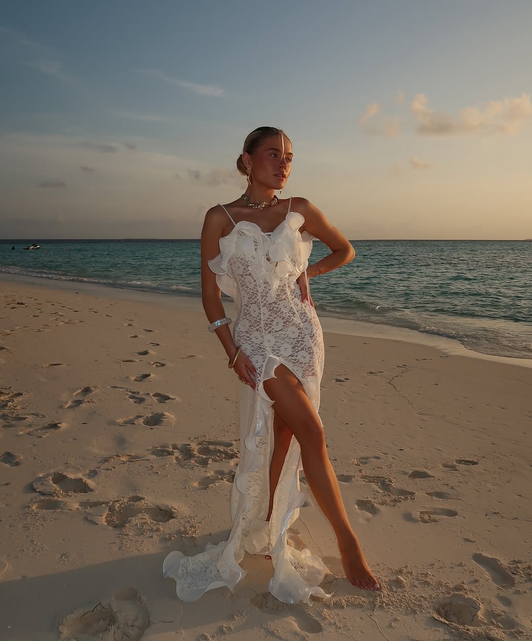 The Catherine Gown is an elegant maxi dress designed to highlight femininity with refined sophistication. Its plunging back neckline adds a subtle allure, complemented by delicate organza ruffles and adjustable straps that ensure both comfort and a tailored fit. Crafted individually, this gown celebrates your unique style while offering an exclusive, striking presence for any special occasion.