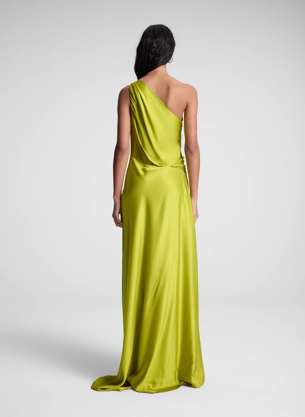 The Aster Satin One Shoulder Gown by A.L.C features a fully lined interior for optimal comfort and structure. Its hidden side zipper ensures a seamless silhouette, while the ruffled satin fabric adds sophisticated texture and movement. Perfect for formal occasions, this gown combines elegant design with practical details for a refined look.