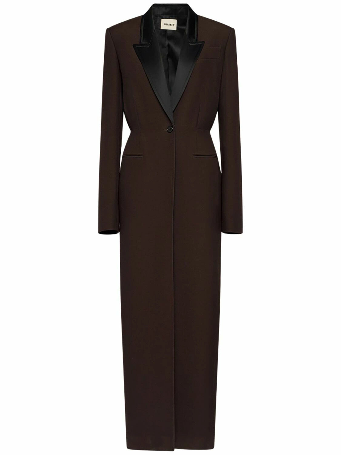 Elevate your outerwear collection with the Bellow Viscose Blend Long Coat by Khaite. Expertly crafted from a luxurious viscose blend, this coat features a clean front button closure and two practical front slit pockets for effortless functionality. Fully lined for comfort and durability, it offers a refined silhouette and timeless appeal, perfect for sophisticated layering in cooler seasons.