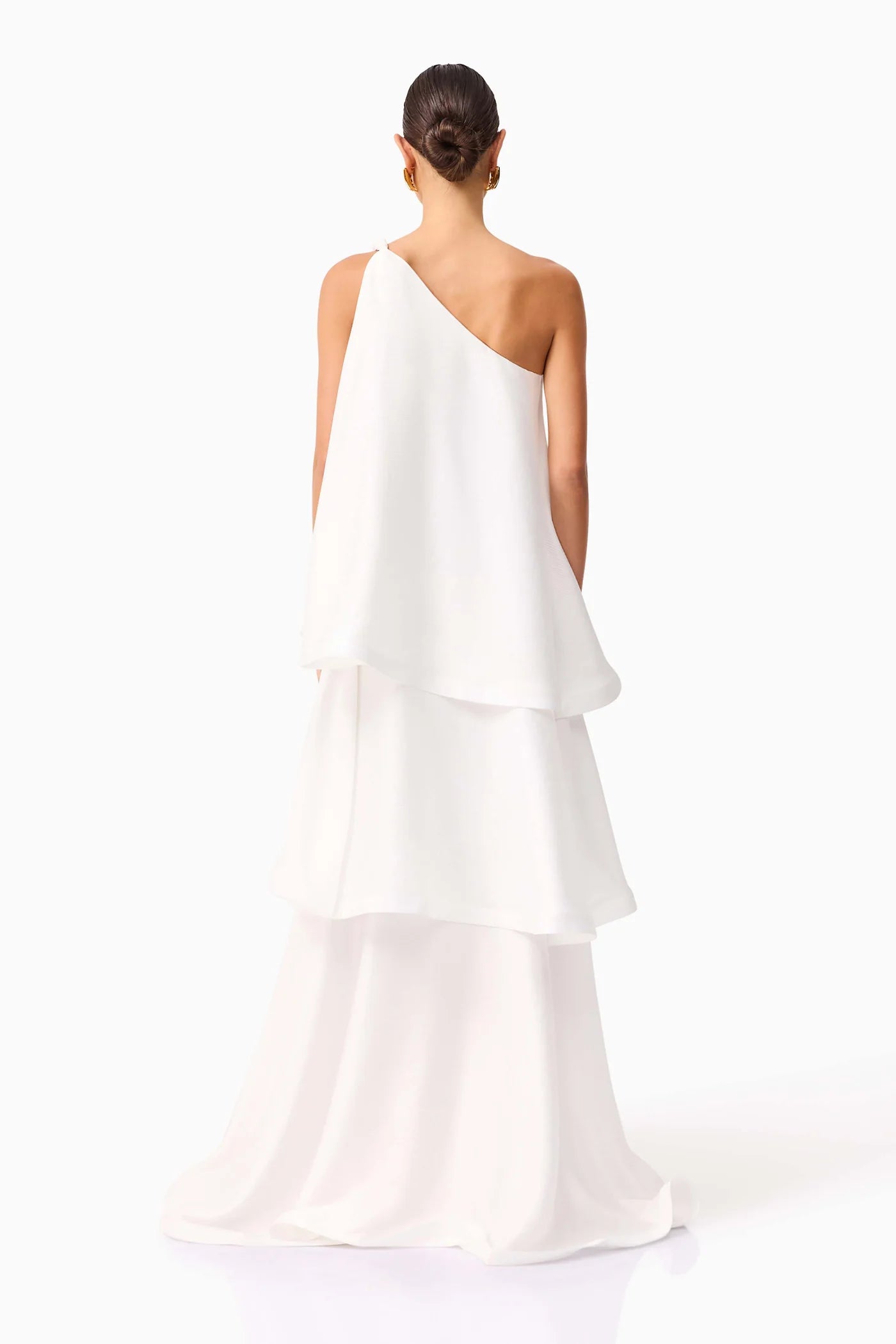 The Tilly Maxi Dress combines refined elegance with effortless comfort, featuring a carefully crafted flared tiered silhouette. Designed to complement both casual day outings and upscale evening events, this dress offers versatile sophistication for the discerning woman seeking style and grace in every occasion.