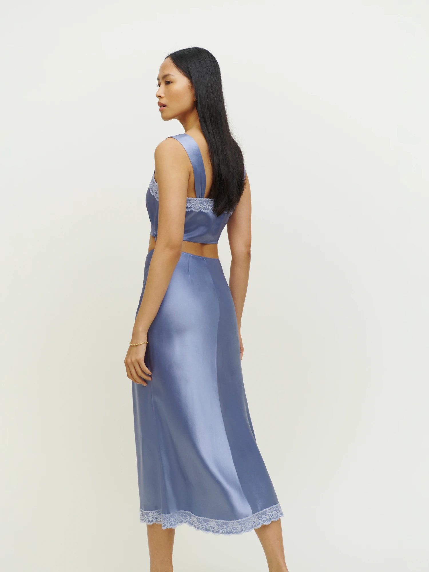 Reformation’s Beatrice Silk Set exemplifies sustainable luxury, crafted from eco-friendly materials that honor both style and the environment. This set features premium silk sourced responsibly, ensuring a soft, breathable feel while minimizing ecological impact. Designed with the modern wardrobe in mind, it balances timeless elegance with conscious production practices, from climate-neutral manufacturing to transparent sourcing. 