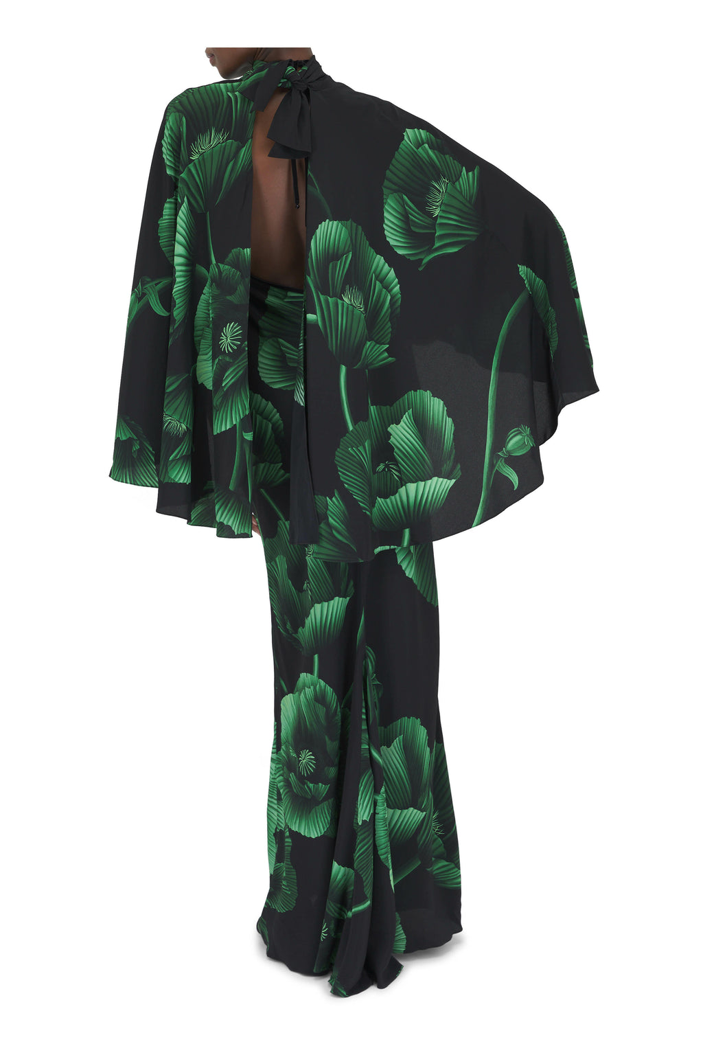 Elevate your wardrobe with the Simple Opulence Green Floral Maxi Dress by Johanna Ortiz. This expertly crafted dress features a flowing silhouette adorned with delicate green floral patterns, combining refined elegance with a touch of natural vibrancy. Its lightweight fabric ensures comfort and grace from day to night, making it an ideal choice for sophisticated occasions or elevated everyday wear. The design reflects timeless style, offering an effortless way to showcase understated luxury.