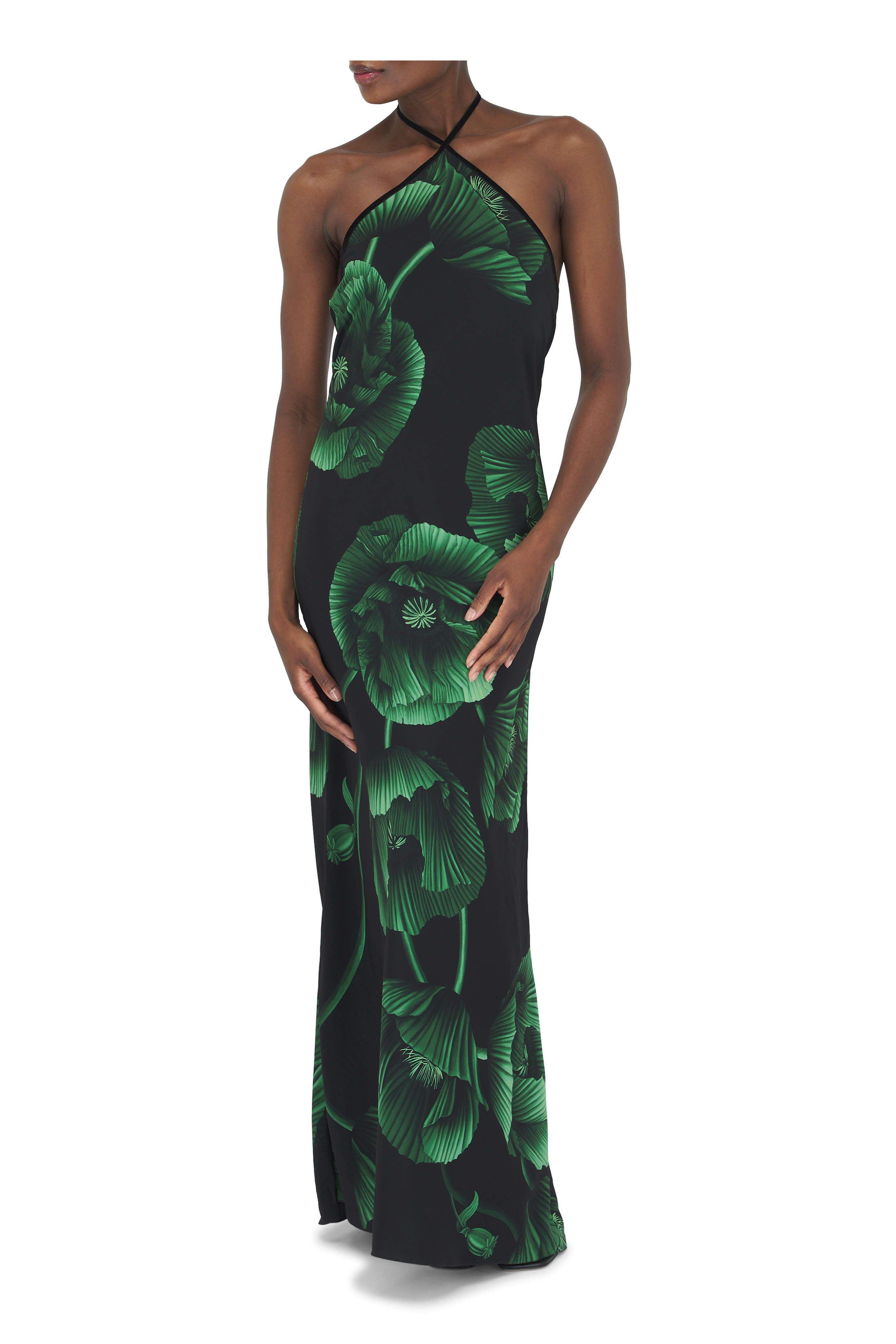 Elevate your wardrobe with the Simple Opulence Green Floral Maxi Dress by Johanna Ortiz. This expertly crafted dress features a flowing silhouette adorned with delicate green floral patterns, combining refined elegance with a touch of natural vibrancy. Its lightweight fabric ensures comfort and grace from day to night, making it an ideal choice for sophisticated occasions or elevated everyday wear. The design reflects timeless style, offering an effortless way to showcase understated luxury.