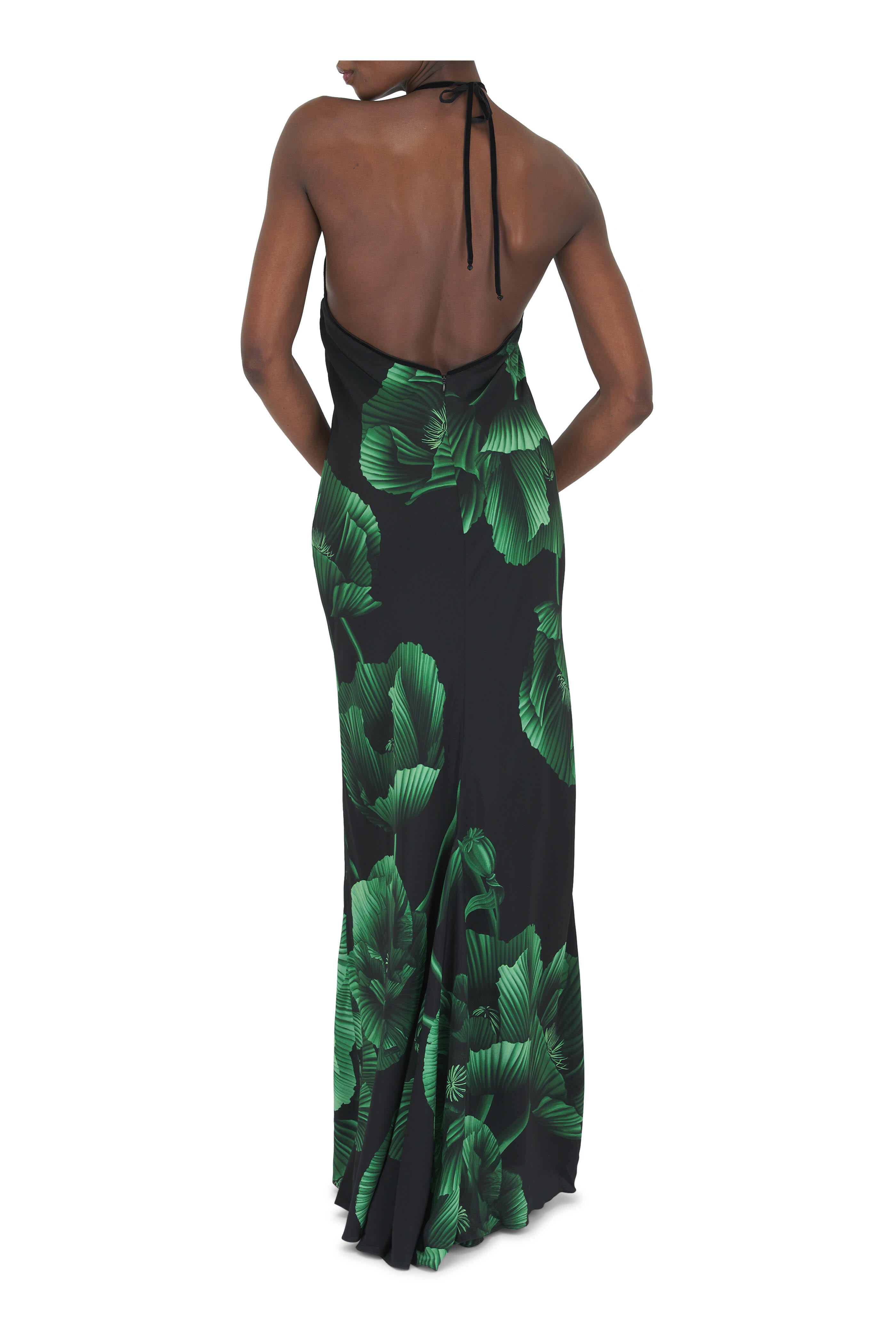 Elevate your wardrobe with the Simple Opulence Green Floral Maxi Dress by Johanna Ortiz. This expertly crafted dress features a flowing silhouette adorned with delicate green floral patterns, combining refined elegance with a touch of natural vibrancy. Its lightweight fabric ensures comfort and grace from day to night, making it an ideal choice for sophisticated occasions or elevated everyday wear. The design reflects timeless style, offering an effortless way to showcase understated luxury.