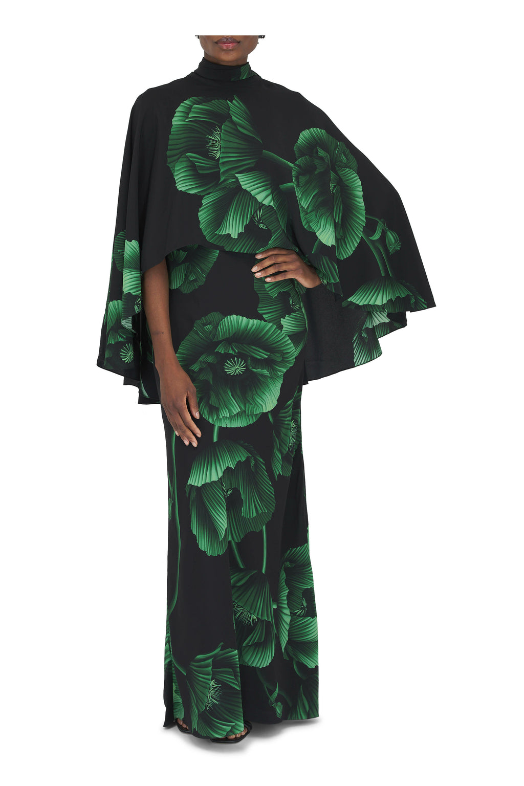 Elevate your wardrobe with the Simple Opulence Green Floral Maxi Dress by Johanna Ortiz. This expertly crafted dress features a flowing silhouette adorned with delicate green floral patterns, combining refined elegance with a touch of natural vibrancy. Its lightweight fabric ensures comfort and grace from day to night, making it an ideal choice for sophisticated occasions or elevated everyday wear. The design reflects timeless style, offering an effortless way to showcase understated luxury.