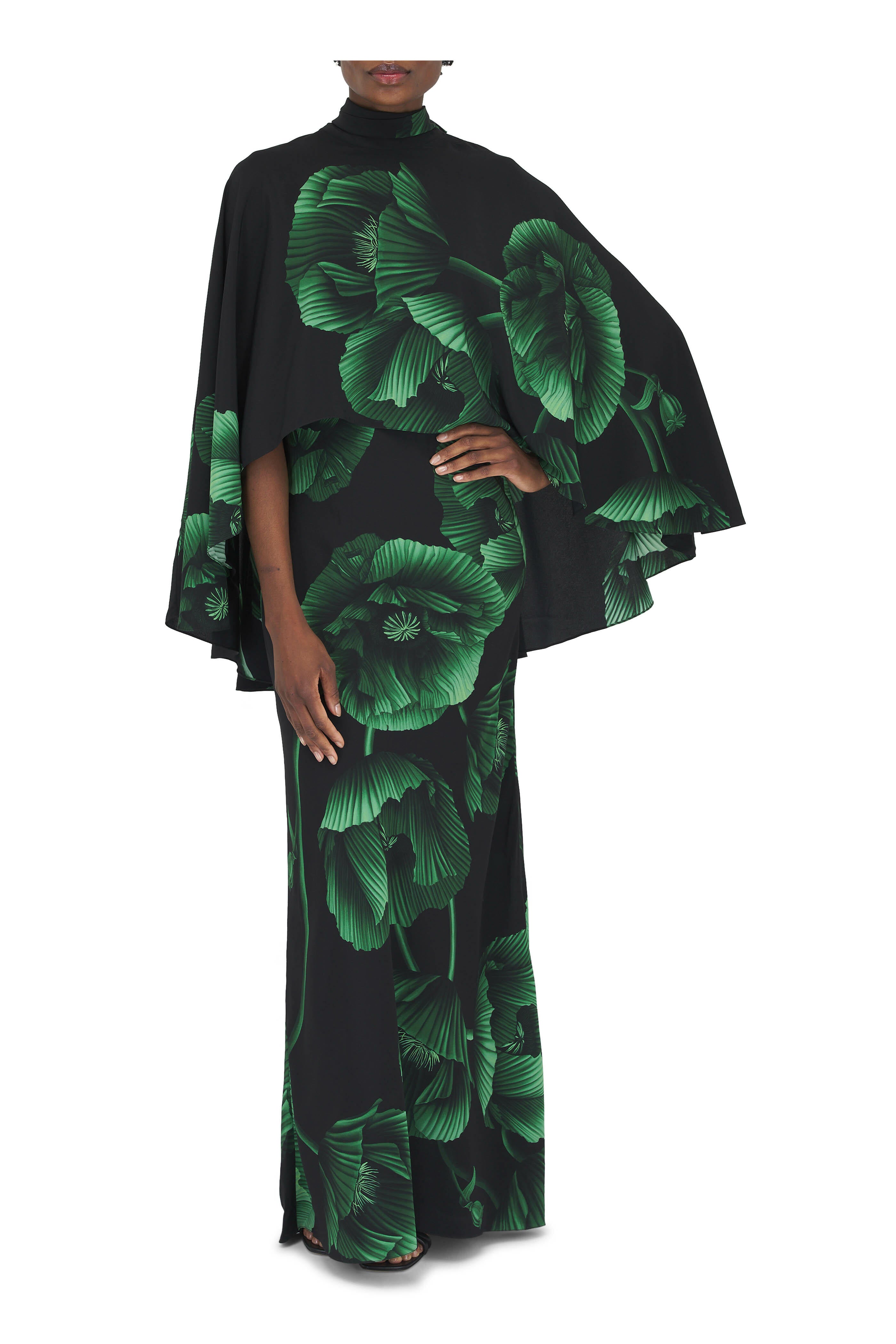 Elevate your wardrobe with the Simple Opulence Green Floral Maxi Dress by Johanna Ortiz. This expertly crafted dress features a flowing silhouette adorned with delicate green floral patterns, combining refined elegance with a touch of natural vibrancy. Its lightweight fabric ensures comfort and grace from day to night, making it an ideal choice for sophisticated occasions or elevated everyday wear. The design reflects timeless style, offering an effortless way to showcase understated luxury.