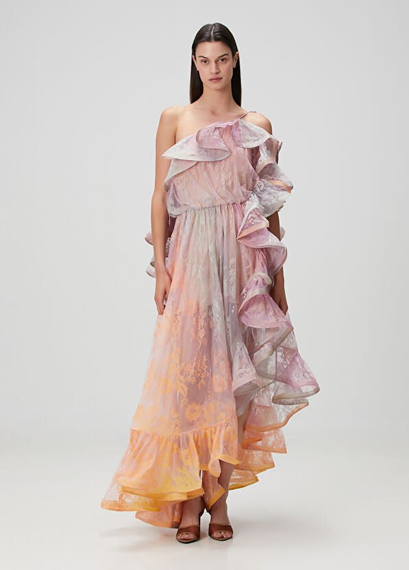 This elegant maxi dress features a distinctive one-shoulder design with an asymmetric neckline that adds a modern touch. Crafted from delicate lace, it offers a refined texture enhanced by flounced detailing and a laced shoulder strap for added sophistication. Perfect for formal occasions, its flowing silhouette ensures graceful movement while highlighting your poise and style.