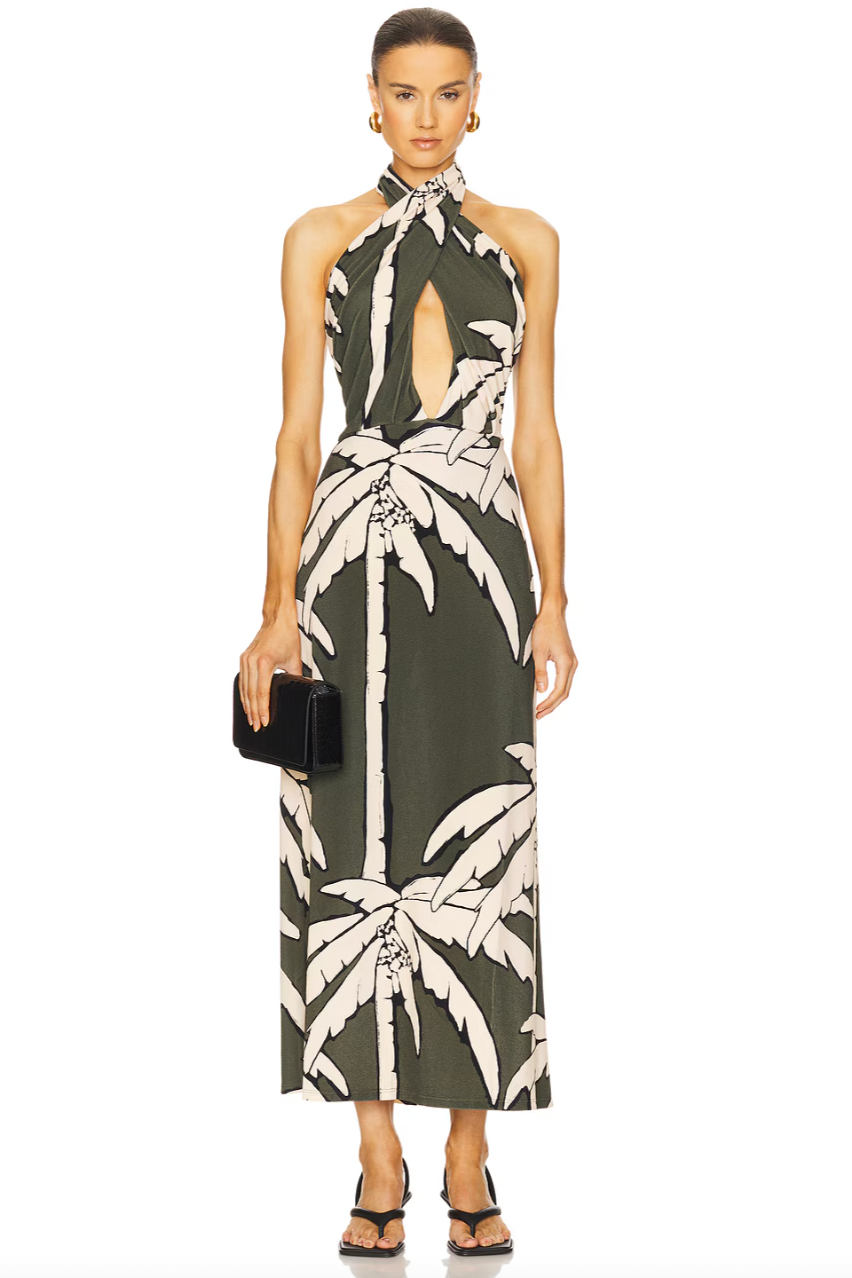 The Oceanic Mantra Ankle Dress by Johanna Ortiz features a partially lined bust for comfortable coverage and support. Its pull-on design with a halterneck tie ensures a customizable fit and easy wear. The distinctive cut-out details add a modern, stylish edge, making it an ideal choice for sophisticated summer occasions.