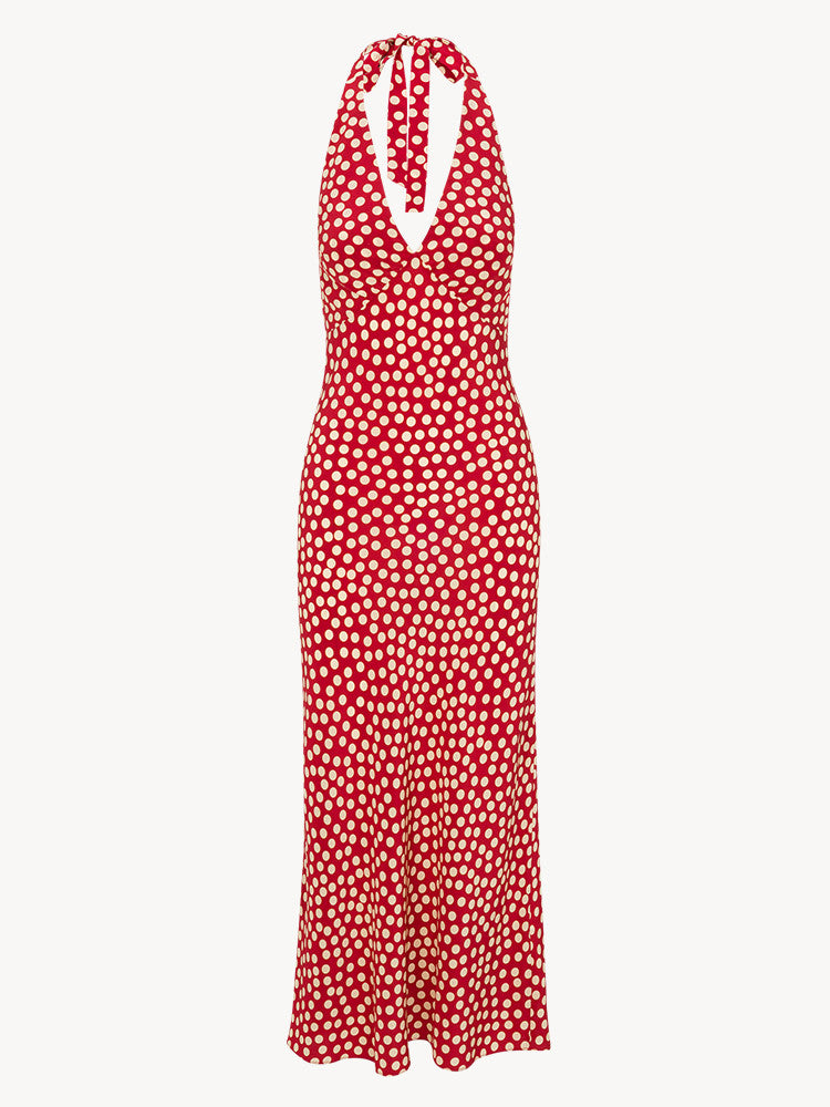 The Simone in Bordeaux is an ankle-length dress designed to accentuate a bombshell bust line, ideal for late summer elegance. Its timeless polka dot pattern offers a fresh, classic look that requires minimal styling—no bra needed. Perfect worn with hair up or down and paired with subtle jewelry, it embodies effortless, endless summer charm for confident Dreamgirls.