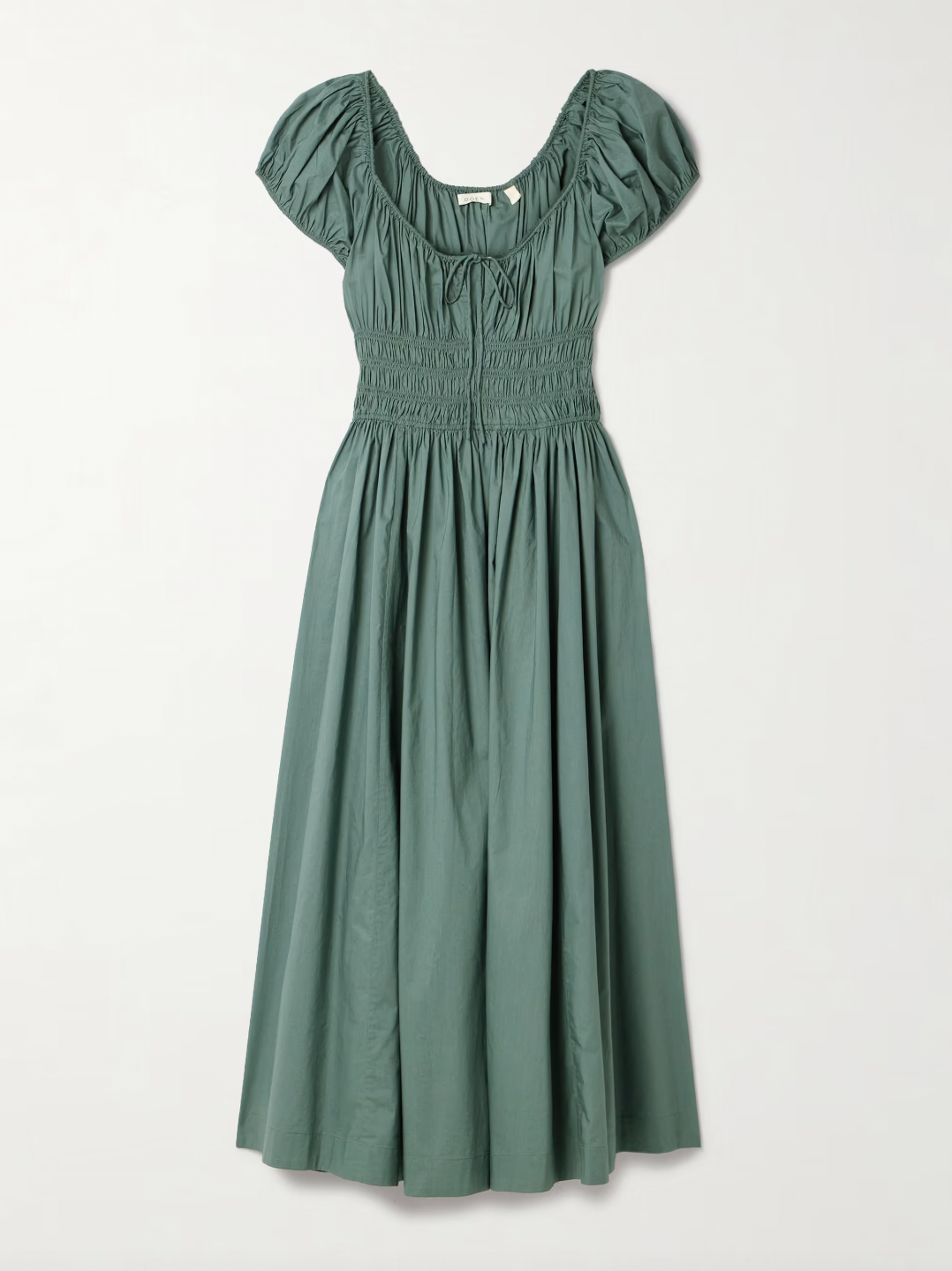 Crafted from organic cotton-poplin, the Quinn midi dress by Doen combines sustainable fabric with expert tailoring. Its shirred bodice and tie detailing create a flattering fit, enhancing natural curves while providing comfort. This versatile piece seamlessly transitions from day to evening, reflecting thoughtful design and eco-conscious materials in a refined silhouette.