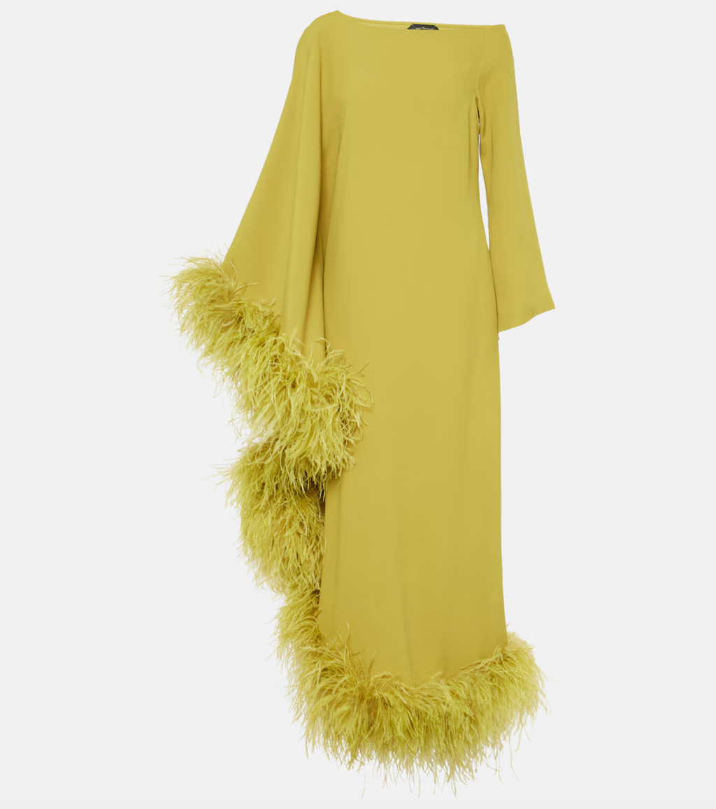 Elevate your formal wardrobe with the Ubud Extravaganza feather-trimmed gown by Taller Marmo. This exquisite dress combines sophisticated tailoring with delicate feather accents, creating an elegant silhouette that commands attention. Ideal for special occasions, it offers a refined balance of texture and movement, ensuring you stand out with effortless grace.