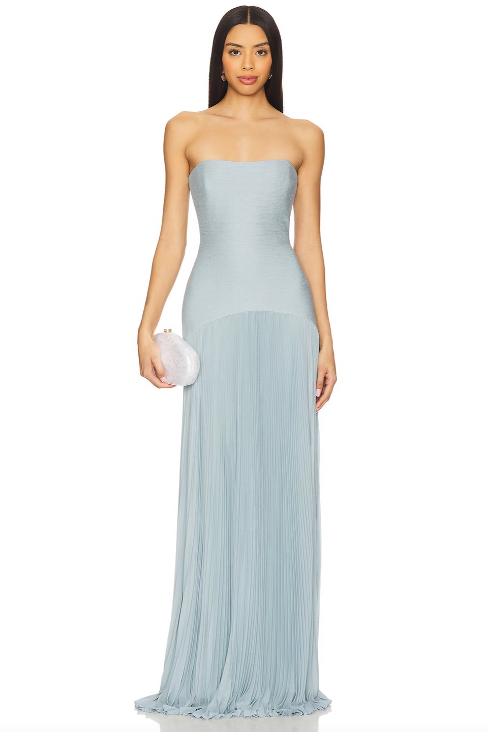 The Sunniva Dress in Blue by Alexis features a sophisticated drop waist silhouette crafted from delicate pleated chiffon, offering elegant movement and texture. Fully lined for comfort and opacity, it secures with a hidden back zipper and hook-and-eye closure, ensuring a seamless fit. This dress requires dry cleaning to maintain its refined fabric quality and structure. Perfect for occasions demanding polished style and expert tailoring.
