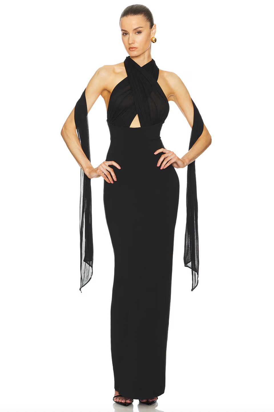 The Amber Dress by Helsa Studio strikes a perfect balance between elegance and daring style. Its sculpted silhouette and delicate draping create a flattering shape, while the halter neckline and sheer scarf add a sophisticated flair. The flared hem ensures graceful movement, and the sheer bodice introduces a bold, confident edge. Ideal for making a memorable impression, this dress offers a refined yet distinctive look for any special occasion.