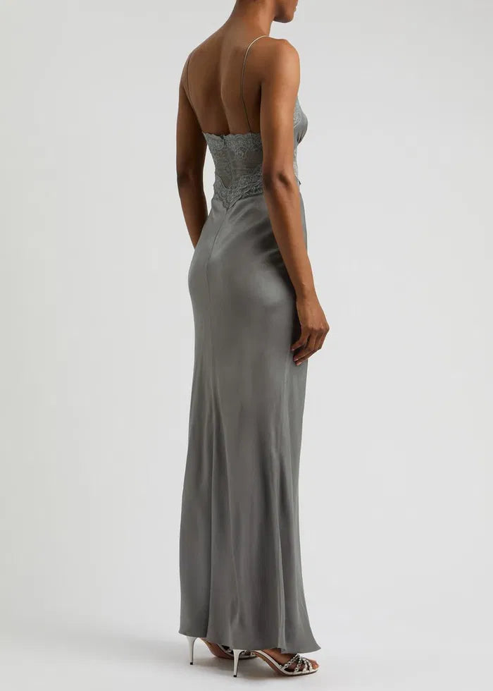 The Amoras Lace-Trimmed Satin Maxi Slip Dress exemplifies sophisticated contemporary design. Its smooth satin fabric drapes elegantly in a flattering maxi silhouette, enhanced by delicate lace trim to add refinement. Perfect for occasions requiring understated luxury, this dress seamlessly blends modern style with timeless elegance, embodying the confident color palette and sleek tailoring signature to its Australian heritage.