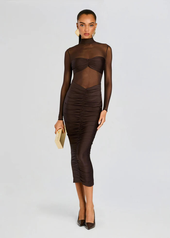 Elevate your style with the Levina Dress by SEROYA, a masterful blend of modern elegance and refined allure. This bodycon midi piece features a sheer bodice paired with a sleek bandeau detail, expertly tailored to accentuate your silhouette with subtle sophistication. Perfect for occasions demanding both poise and a touch of boldness, the Levina Dress in Ash Brown offers a striking yet understated statement.