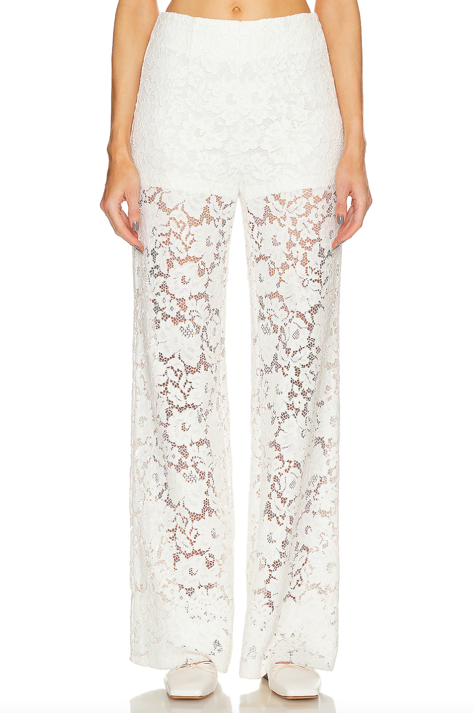 Crafted from a delicate lace fabric blended with cotton, the London Lace Flared Pant offers both elegance and comfort. Featuring a hidden side zipper for a seamless fit, this imported piece requires dry cleaning to maintain its refined texture and shape. Ideal for sophisticated occasions, it combines flattering flare with intricate detailing for a polished look.