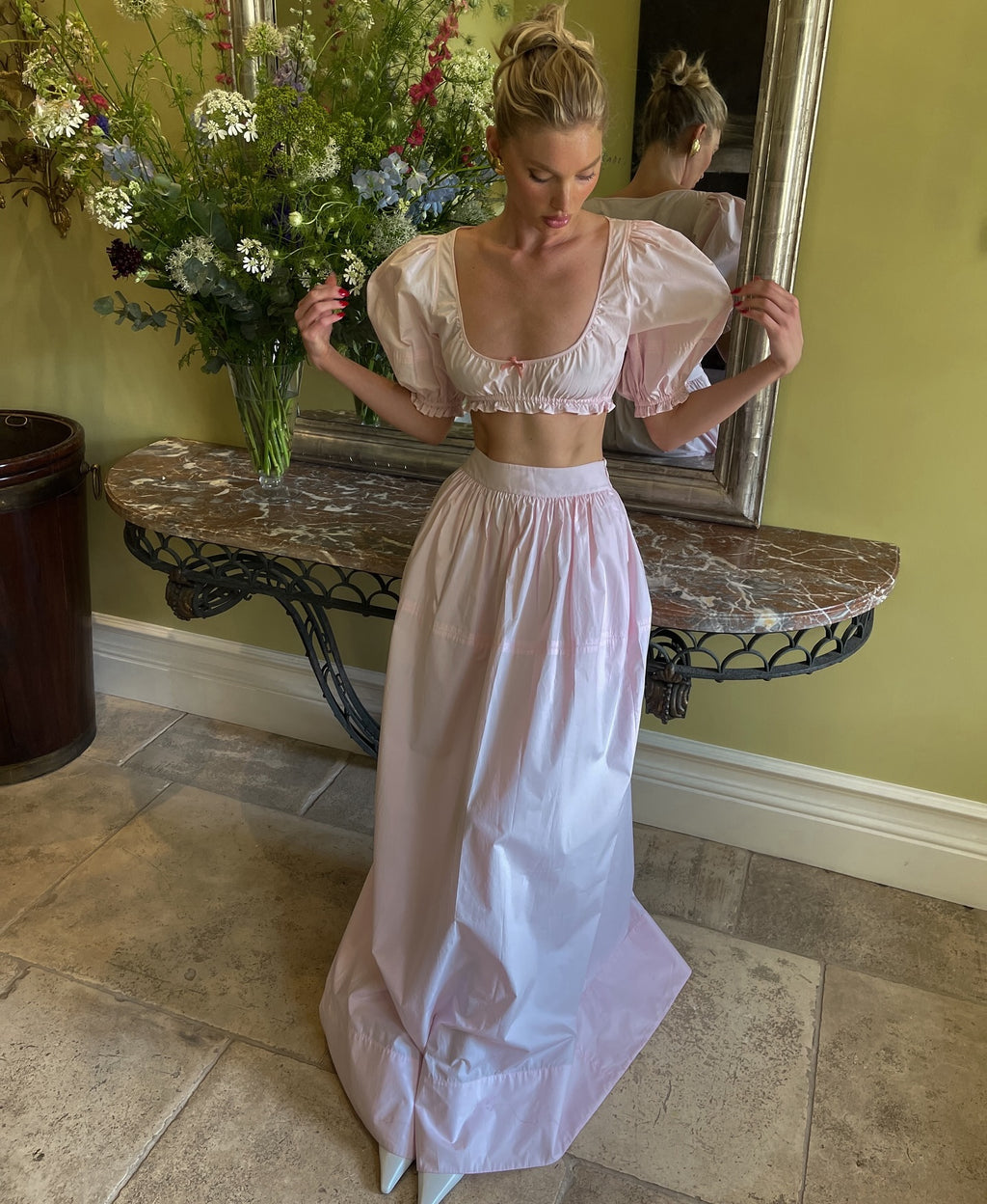 Crafted from 100% cotton lightweight poplin, this maxi skirt offers breathable comfort and a smooth drape. Designed with a hidden side zipper and side slip pockets, it combines practicality with a streamlined silhouette. The unlined construction enhances its light feel, making it ideal for warm weather wear. Note that this item is sold individually, allowing for versatile styling options. Machine washable for easy care, it delivers both function and refined simplicity.