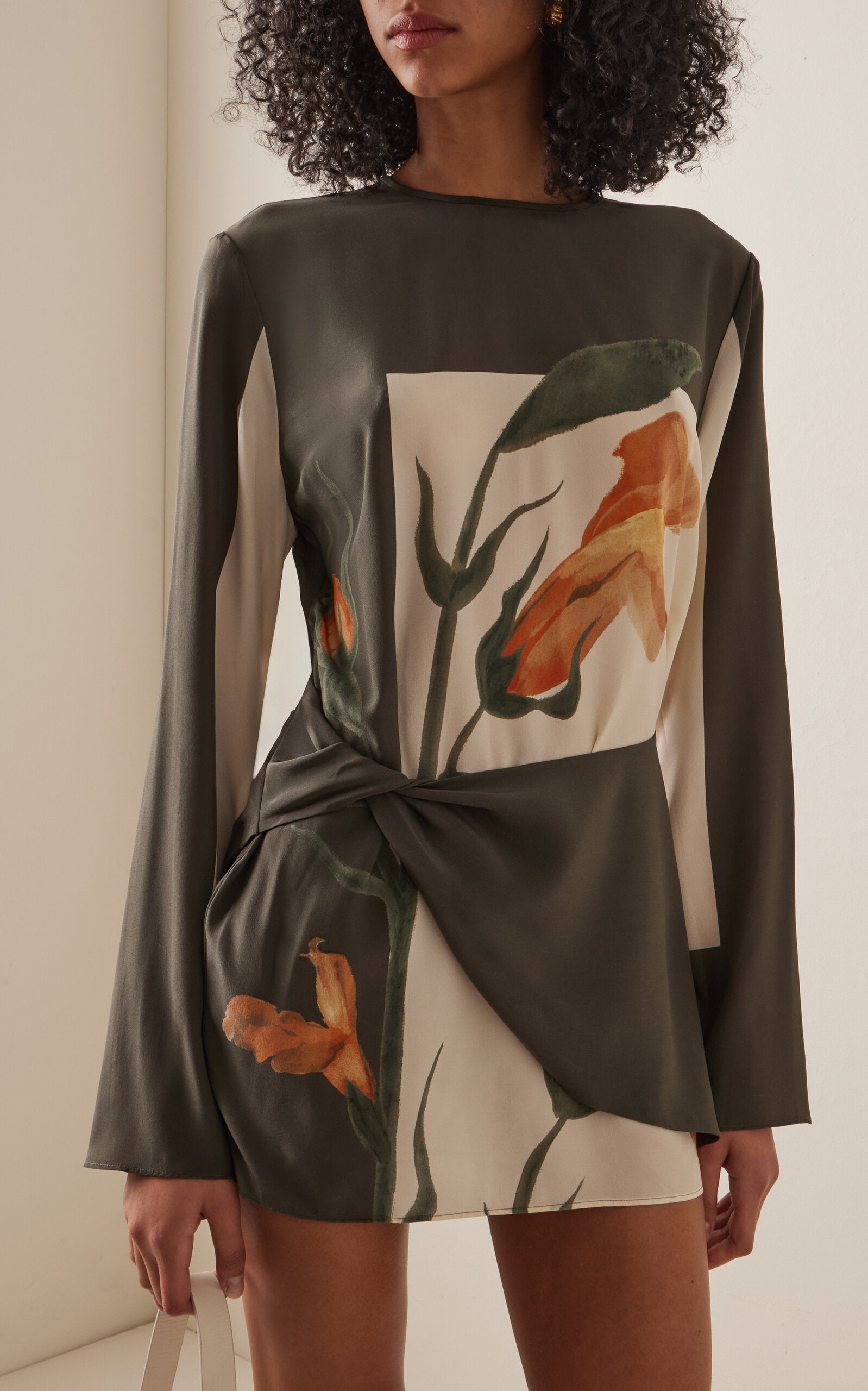 Crafted from 100% silk, the Constance Twist Mini Dress in the elegant Iris shade offers a refined silhouette with a secure zip fastening. Designed for spring, its luxurious fabric and tailored fit ensure both comfort and sophistication. Dry clean only to maintain its pristine condition. Imported quality that combines expert craftsmanship with timeless style.