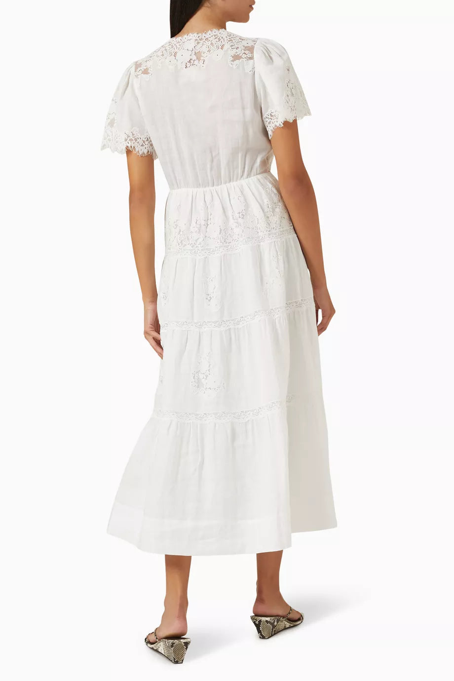 Embrace effortless elegance with the Graciella Lace-trim Maxi Dress by Doen, expertly crafted from breathable ramie fabric. The refined silhouette features a structured bodice that flatters your frame, flowing into a graceful A-line skirt that moves beautifully with every step. Delicate lace trim adds a touch of sophistication, making this versatile piece perfect for warm-weather occasions—from intimate gatherings to outdoor celebrations. A timeless investment piece that transcends seasons.