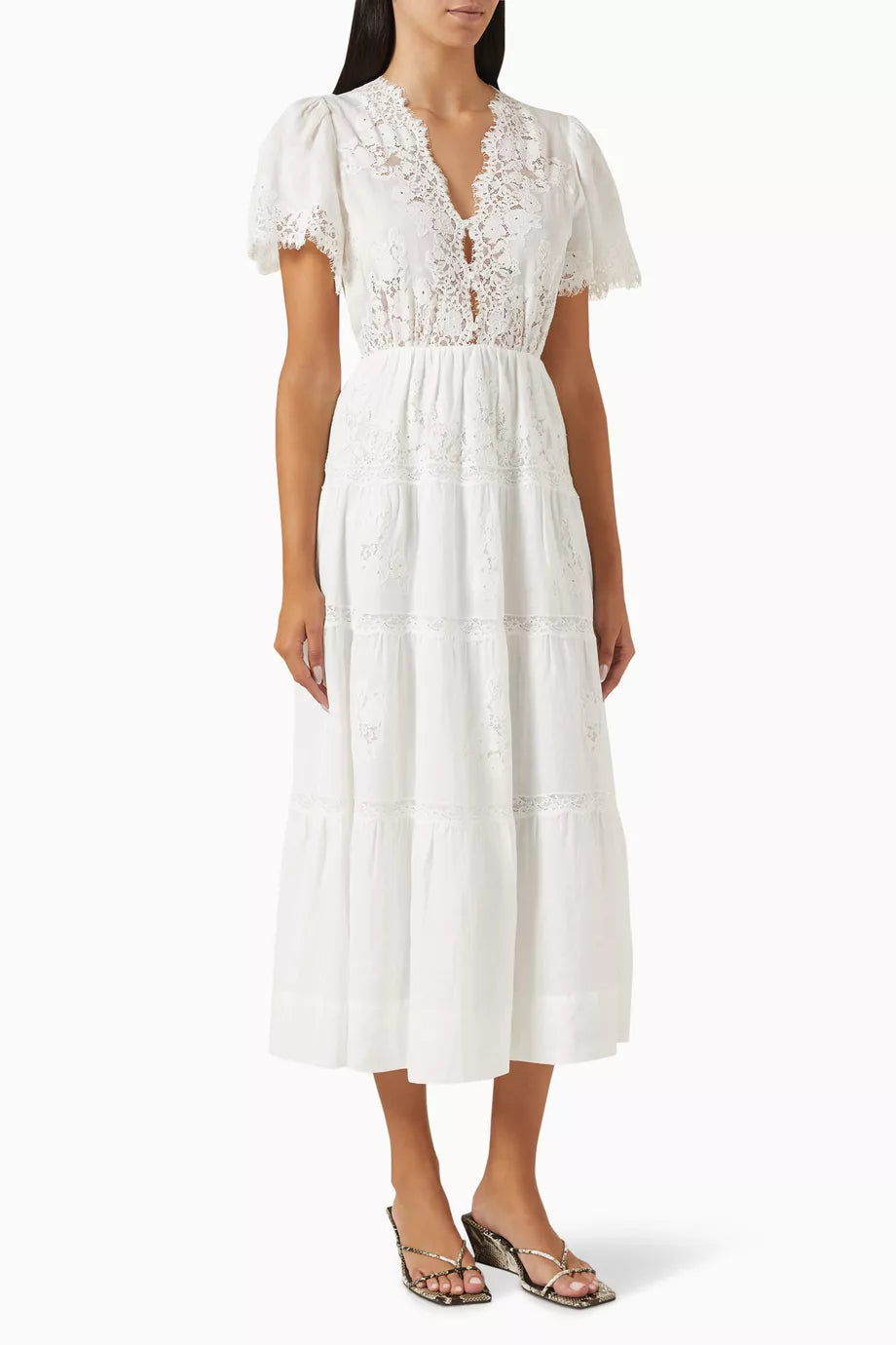 Embrace effortless elegance with the Graciella Lace-trim Maxi Dress by Doen, expertly crafted from breathable ramie fabric. The refined silhouette features a structured bodice that flatters your frame, flowing into a graceful A-line skirt that moves beautifully with every step. Delicate lace trim adds a touch of sophistication, making this versatile piece perfect for warm-weather occasions—from intimate gatherings to outdoor celebrations. A timeless investment piece that transcends seasons.