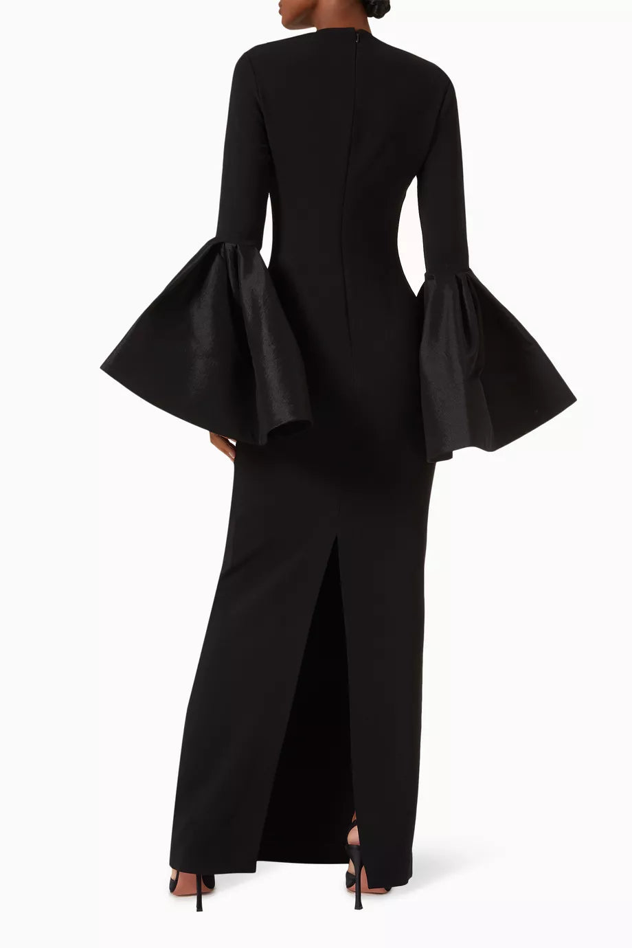 The Suri Flare-sleeve Maxi Dress by Solace London is expertly tailored for elegance and movement. Its dramatic flared cuffs create a striking silhouette, perfect for upscale occasions, while the rear slit offers both style and ease of movement, allowing you to navigate social settings with confidence and grace.