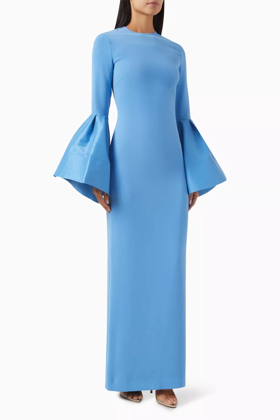 The Suri Flare-sleeve Maxi Dress by Solace London is expertly tailored for elegance and movement. Its dramatic flared cuffs create a striking silhouette, perfect for upscale occasions, while the rear slit offers both style and ease of movement, allowing you to navigate social settings with confidence and grace.