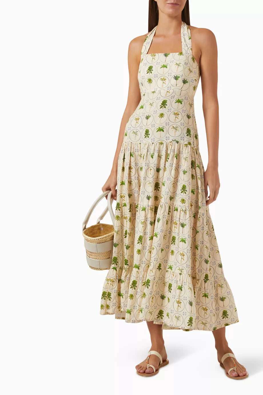 The Willow Printed Dress in Linen by Palm Noosa is a versatile wardrobe essential that effortlessly transitions from day to evening. Constructed from breathable premium linen, this halter-neck design showcases a gracefully flowing full skirt balanced by a fitted bodice that defines your silhouette. An elasticated back panel ensures all-day comfort without compromising on style. 