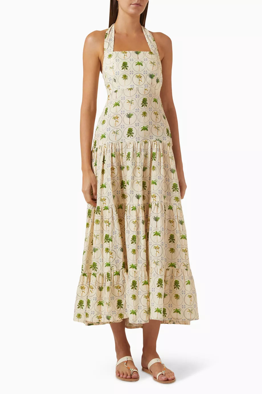 The Willow Printed Dress in Linen by Palm Noosa is a versatile wardrobe essential that effortlessly transitions from day to evening. Constructed from breathable premium linen, this halter-neck design showcases a gracefully flowing full skirt balanced by a fitted bodice that defines your silhouette. An elasticated back panel ensures all-day comfort without compromising on style. 