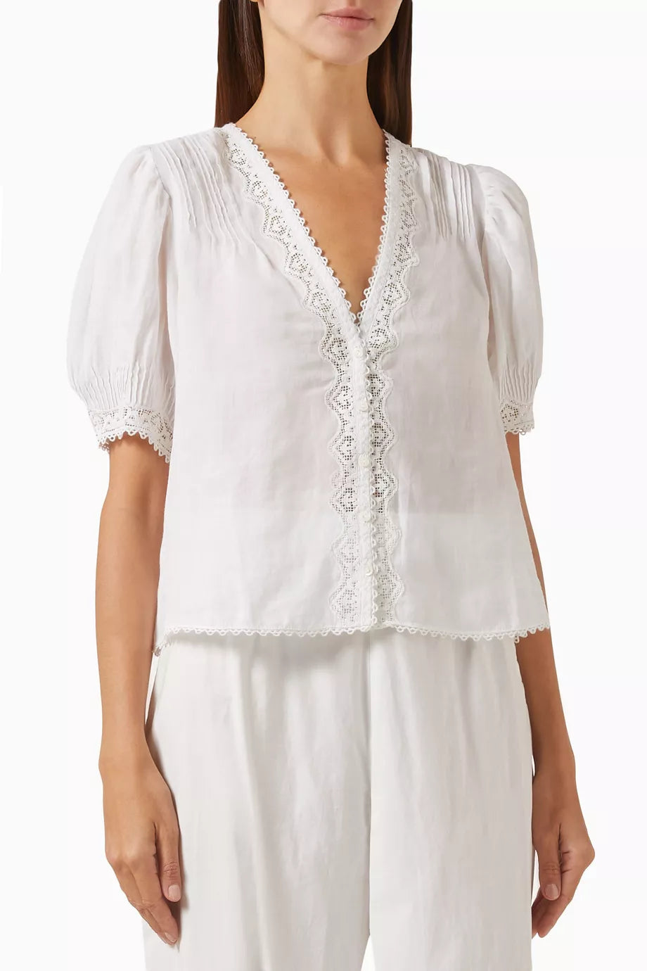 The Brigitta Top in Ramie by DÔEN delivers a relaxed, breathable design ideal for warm weather. Made from lightweight ramie fabric, it ensures comfort with a soft, airy feel. Its versatile silhouette makes it easy to pair with shorts, pants, or skirts, providing flexible styling options for a variety of occasions.