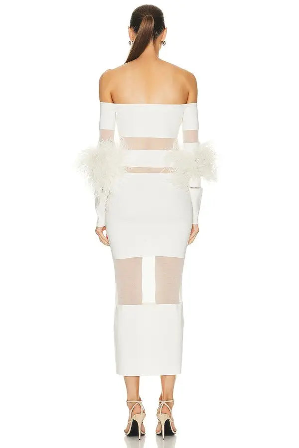 This exquisite Lapointe dress showcases sheer knit panels accented with delicate feather trims, offering a sophisticated textural contrast. The off-shoulder design enhances its elegant silhouette, creating a refined look ideal for special occasions. Crafted from a cotton-viscose blend with intricate intarsia detailing, the dress delivers both comfort and distinctive style.