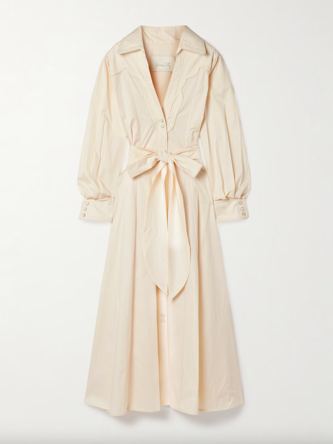 Johanna Ortiz’s Vela De Cruz midi shirt dress elevates a timeless silhouette with expertly tailored cotton-blend poplin. The finely pleated fabric adds refined texture, while the self-tie belt accentuates the waist for a flattering shape. Carefully selected tonal and silver-tone buttons enhance the sophisticated appeal, making this dress a versatile choice for polished, confident dressing.