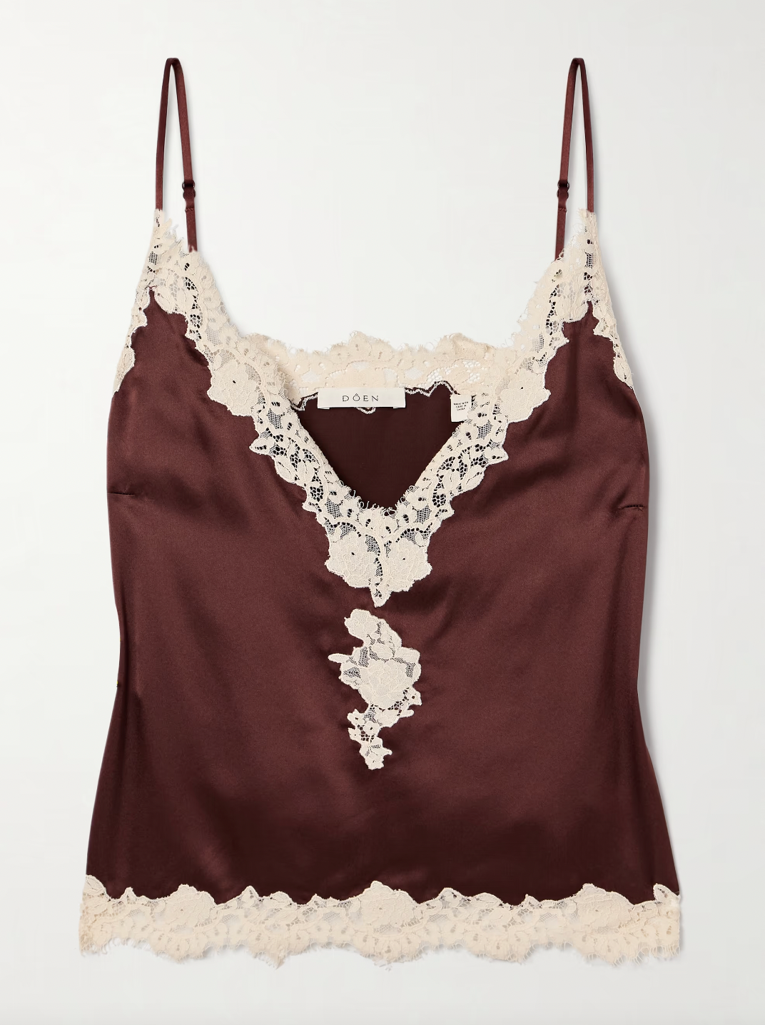 Experience refined elegance with the Kira corded lace-trimmed silk-satin camisole from DÔEN. Crafted from smooth silk-satin, it offers a luxurious feel against the skin, while the delicate corded lace adds an intricate, sophisticated detail. This camisole blends timeless design with a flattering fit, making it an ideal layering piece or statement alone for both day and evening wear. Its breathable fabric ensures comfort, enhancing your wardrobe with understated luxury.