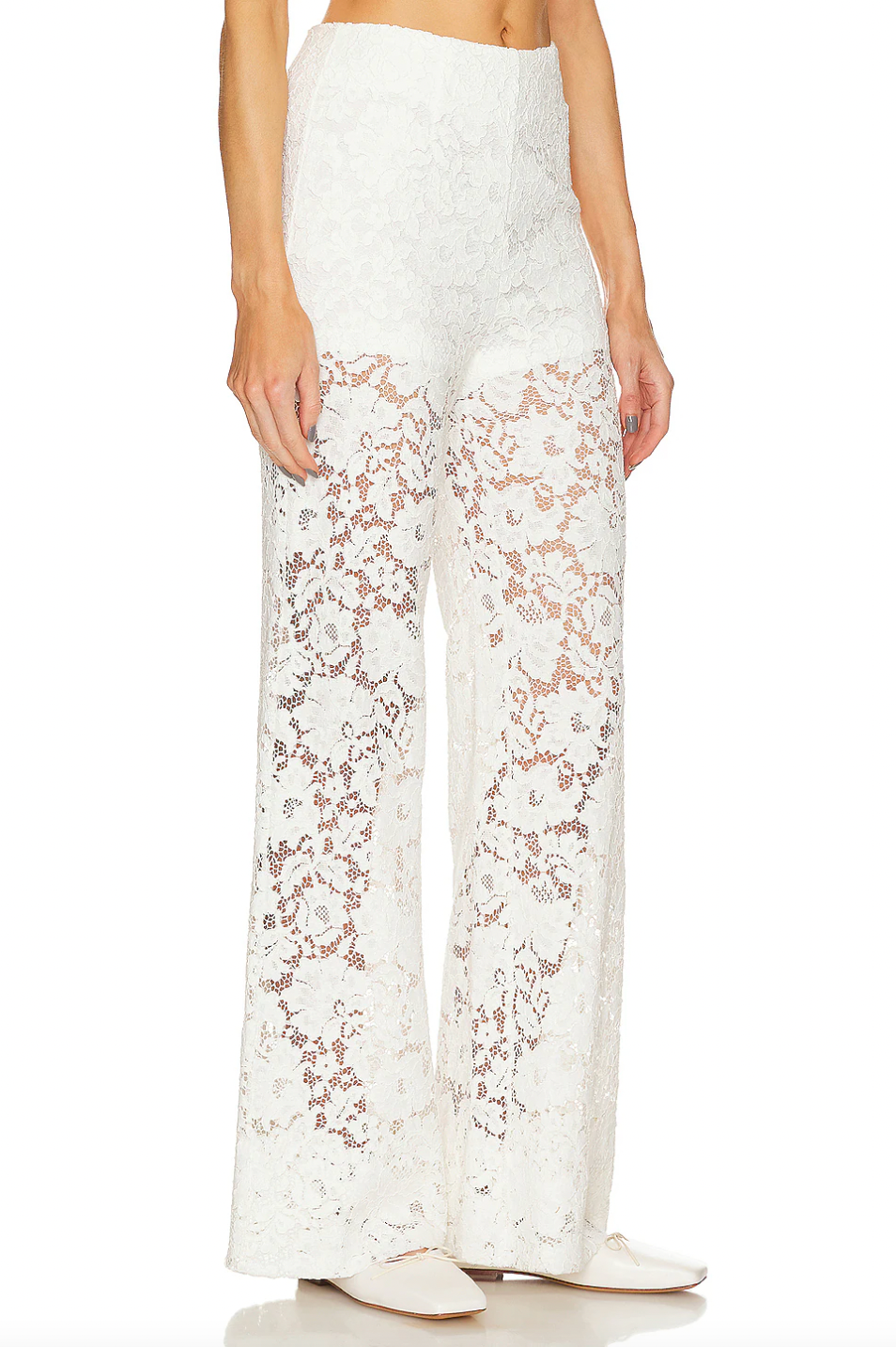 Crafted from a delicate lace fabric blended with cotton, the London Lace Flared Pant offers both elegance and comfort. Featuring a hidden side zipper for a seamless fit, this imported piece requires dry cleaning to maintain its refined texture and shape. Ideal for sophisticated occasions, it combines flattering flare with intricate detailing for a polished look.