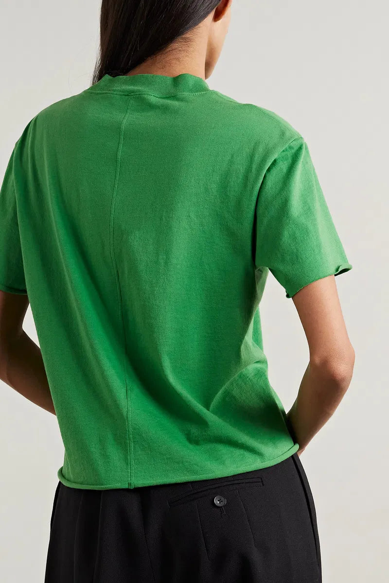 The Fedrino Organic Cotton-Jersey T-Shirt by The Row offers timeless style with exceptional comfort. Crafted from soft organic cotton-jersey, this relaxed-fit tee features dropped shoulders and a slightly wider crewneck for an elevated yet casual look. A subtle back seam adds a refined touch, enhancing its streamlined silhouette. Available in multiple colors, it’s a versatile wardrobe essential designed for enduring wear.