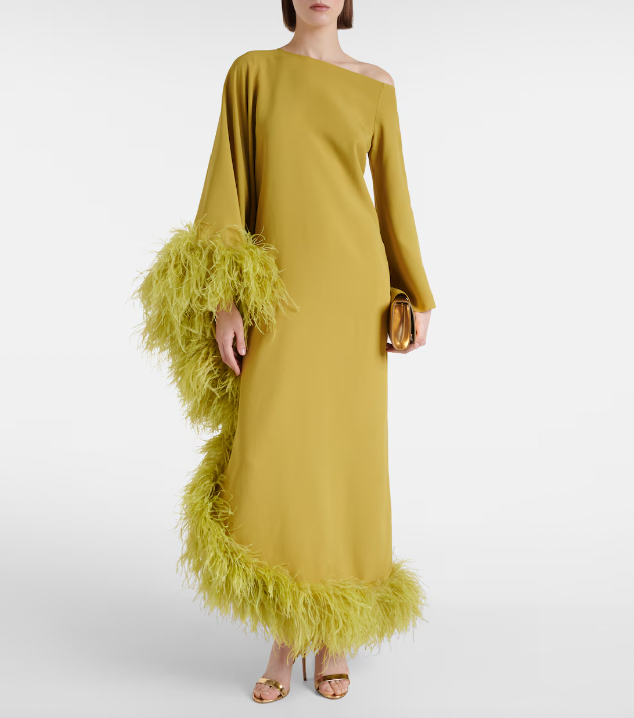 Elevate your formal wardrobe with the Ubud Extravaganza feather-trimmed gown by Taller Marmo. This exquisite dress combines sophisticated tailoring with delicate feather accents, creating an elegant silhouette that commands attention. Ideal for special occasions, it offers a refined balance of texture and movement, ensuring you stand out with effortless grace.