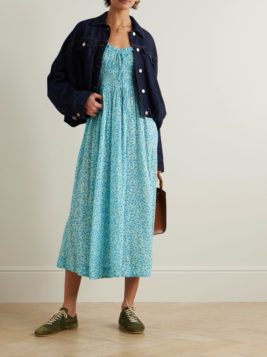 Inspired by the relaxed elegance of Southern California, this Ashlynn midi dress embodies DÔEN's signature romantic aesthetic. Crafted from breathable organic cotton-voile, it features an enchanting all-over floral print that captures effortless sophistication. The shirred bodice provides gentle shaping and comfort, while adjustable ties at the neckline and waist allow you to customize the fit to your preference. 