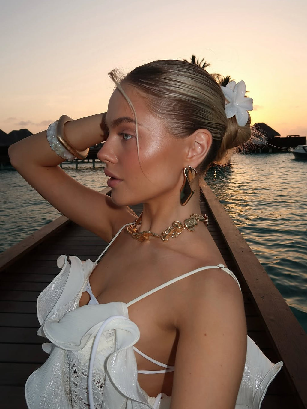 The Catherine Gown is an elegant maxi dress designed to highlight femininity with refined sophistication. Its plunging back neckline adds a subtle allure, complemented by delicate organza ruffles and adjustable straps that ensure both comfort and a tailored fit. Crafted individually, this gown celebrates your unique style while offering an exclusive, striking presence for any special occasion.