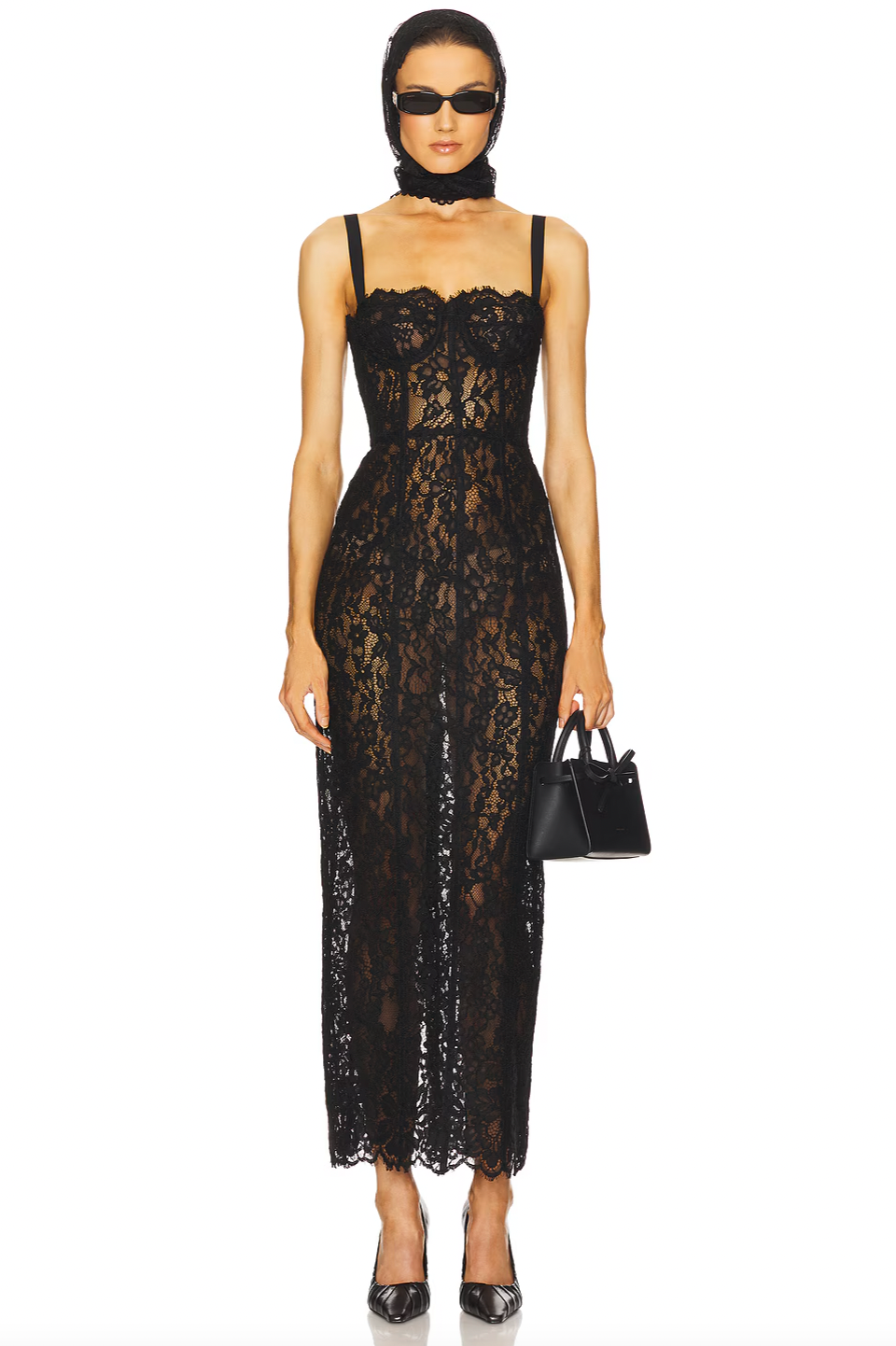 This Lace Column Dress by Helsa features a delicate bustier design with adjustable shoulder straps for a customized fit. The unlined construction offers a lightweight, breathable feel, while the hidden back zipper ensures a seamless silhouette. Crafted with intentionally sheer fabric, this dress subtly reveals undergarments, adding an element of sophisticated allure. Perfect for those seeking an elegant yet daring statement piece.