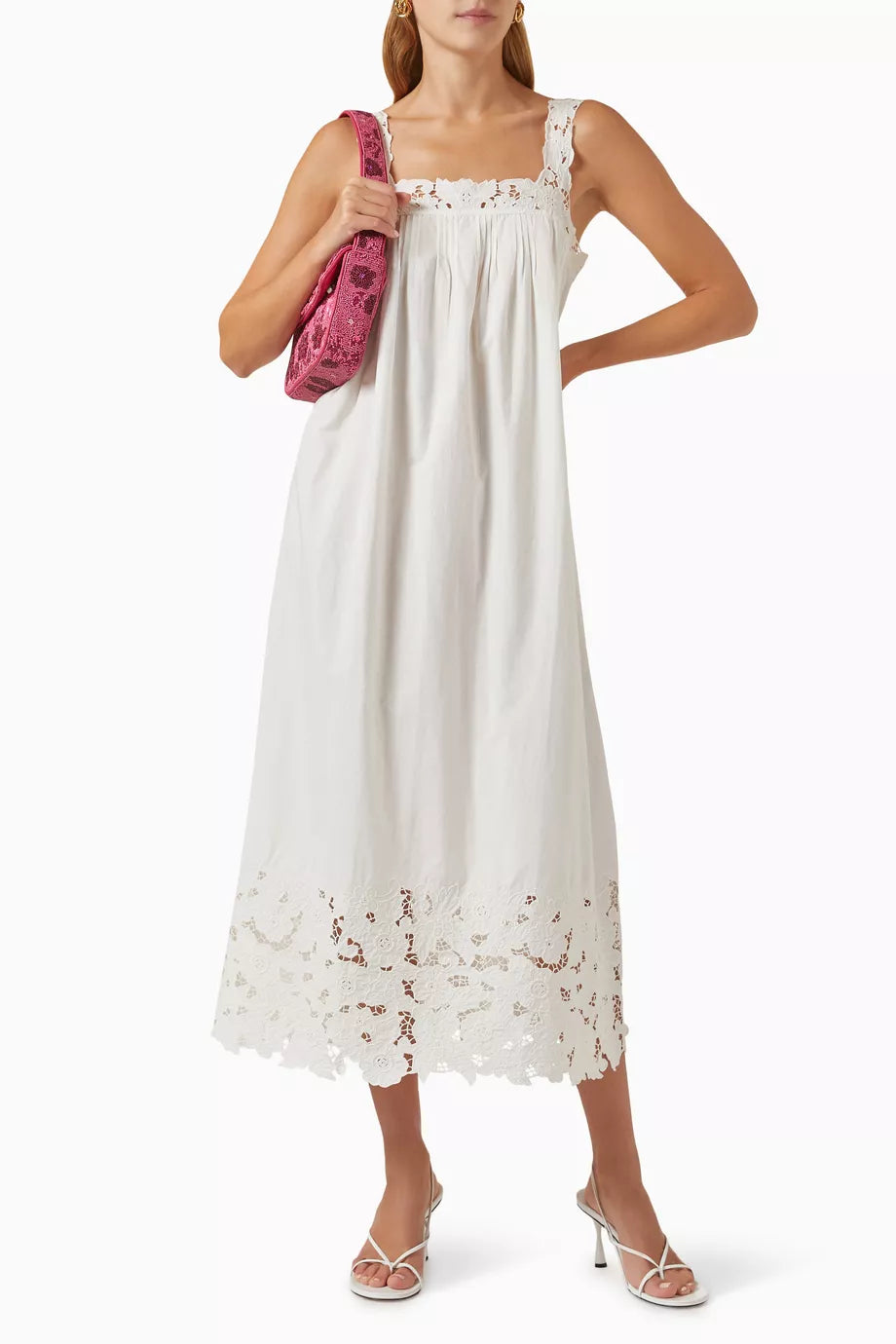 The Ellen Dress in Cotton by DÔEN blends sustainable design with refined craftsmanship. Made from GOTS-certified organic cotton, it offers a breathable, lightweight feel perfect for warm days. Hand-placed floral embroidery adds delicate detail, enhancing its ethereal appeal. Designed with an airy fit, this dress ensures comfort and effortless style, ideal for spontaneous outings or relaxed occasions.