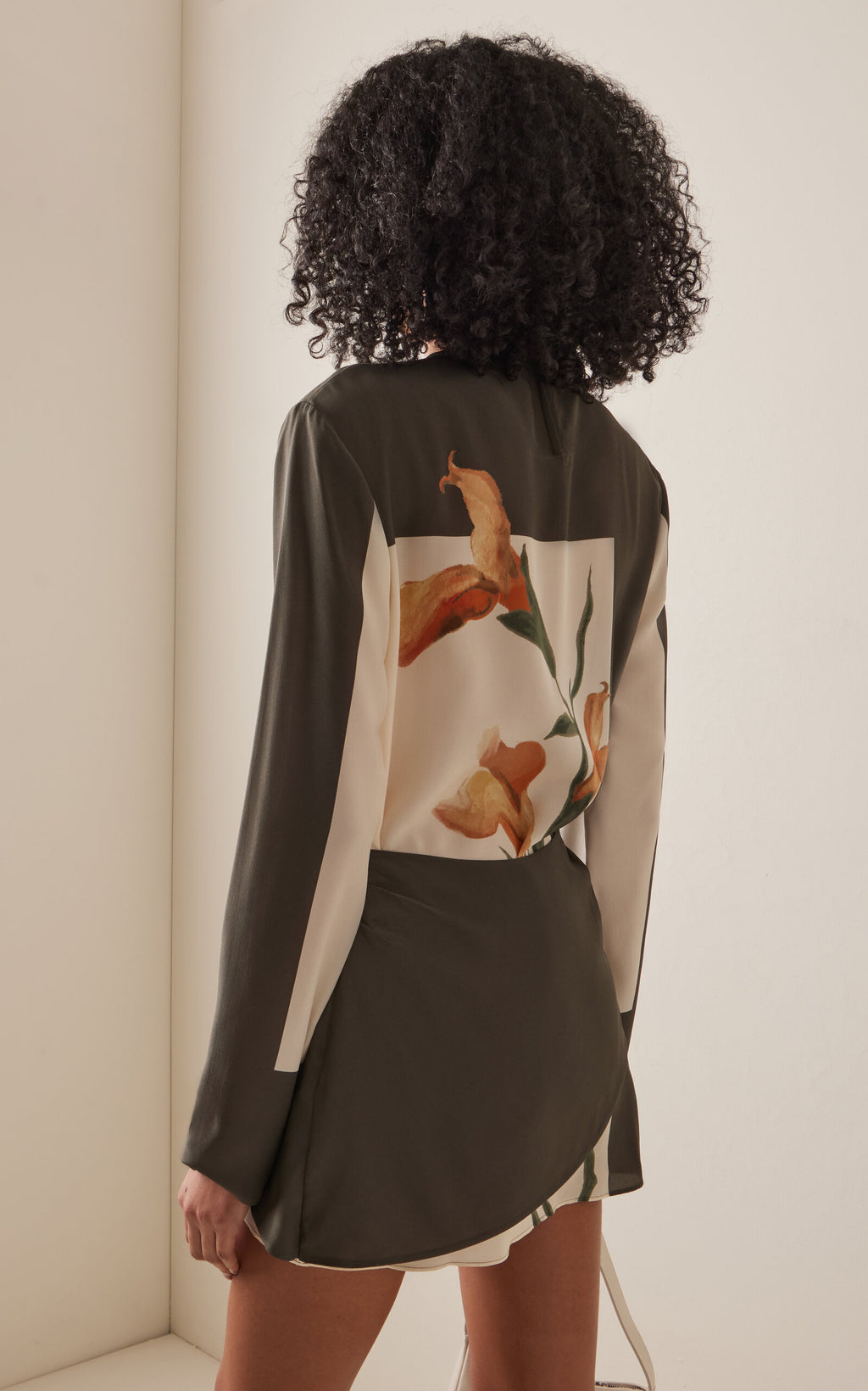 Crafted from 100% silk, the Constance Twist Mini Dress in the elegant Iris shade offers a refined silhouette with a secure zip fastening. Designed for spring, its luxurious fabric and tailored fit ensure both comfort and sophistication. Dry clean only to maintain its pristine condition. Imported quality that combines expert craftsmanship with timeless style.
